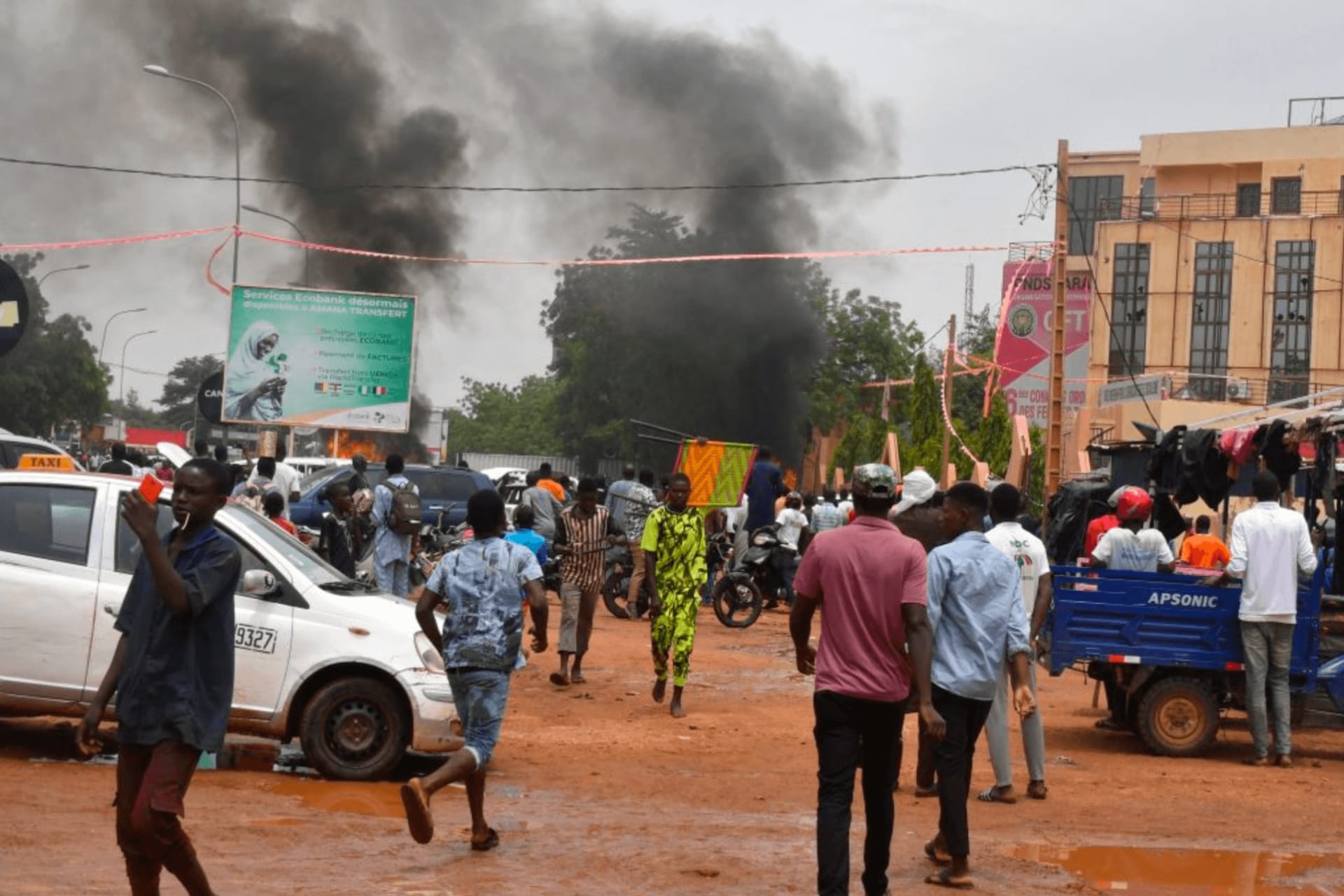 <p> A general view of billowing smoke as supporters of the Nigerien defense and security forces attack the headquarters of the Nigerien Party for Democracy and Socialism (PNDS), the party of overthrown President Mohamed Bazoum, in Niamey on July 27, 2023.</p>
