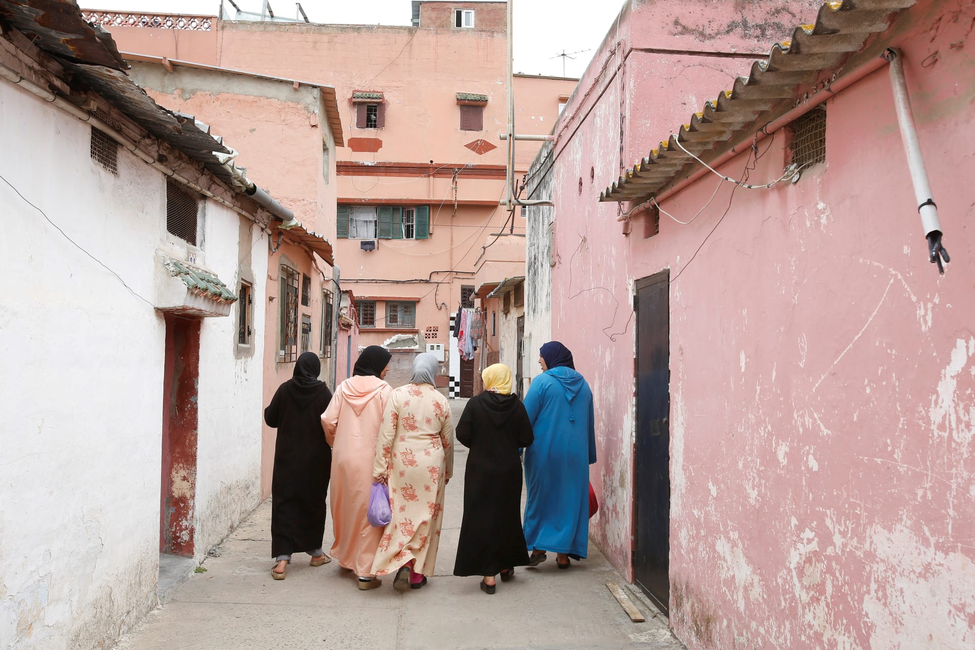 <p>Moroccan women walk along a narrow street in Mohamadia, Morocco, April 28, 2018.</p>
