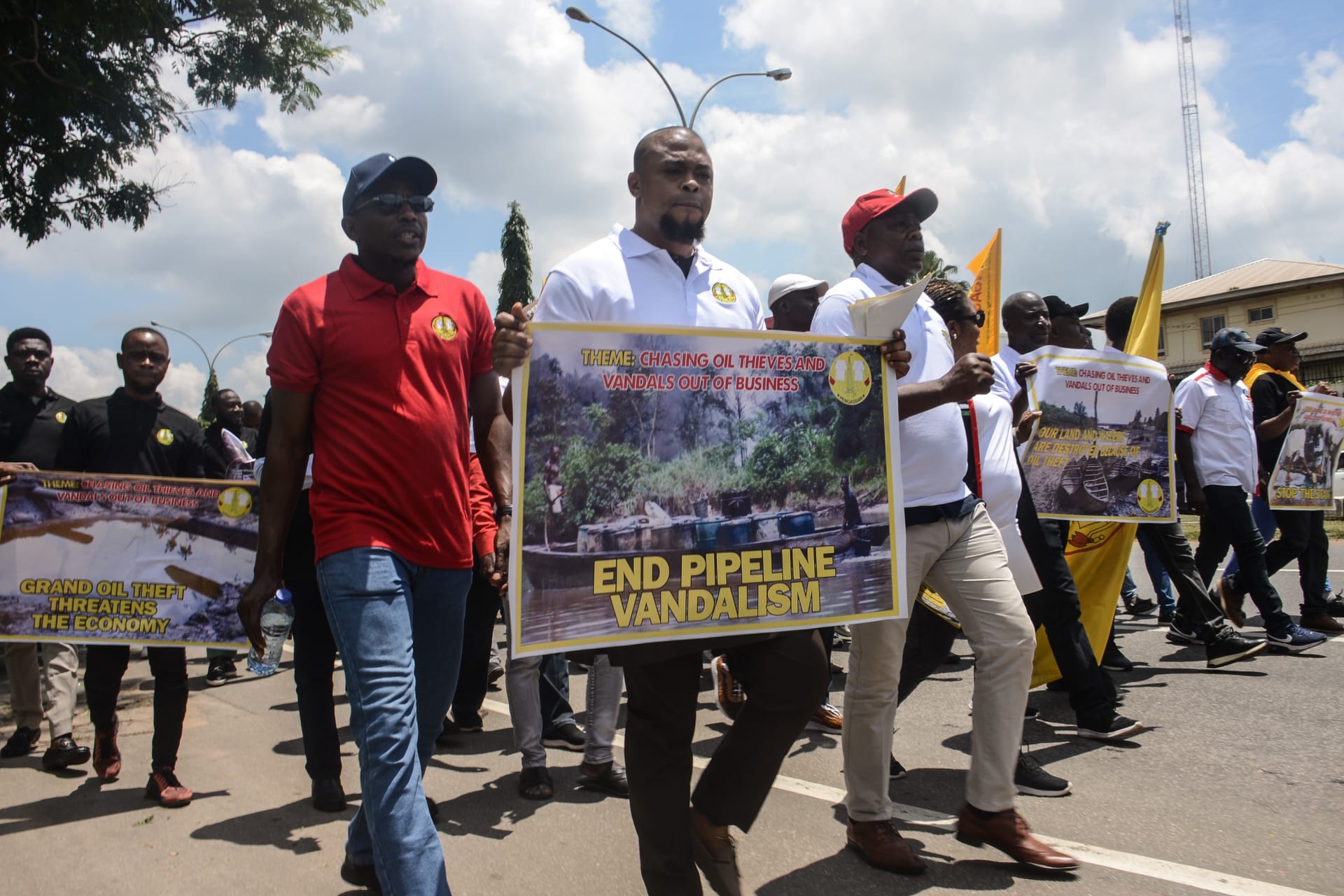 <p>Members of the Petroleum and Natural Gas Senior Staff Association of Nigeria, march during a protest over crude oil theft in Abuja, Nigeria on September 6, 2022.</p>
