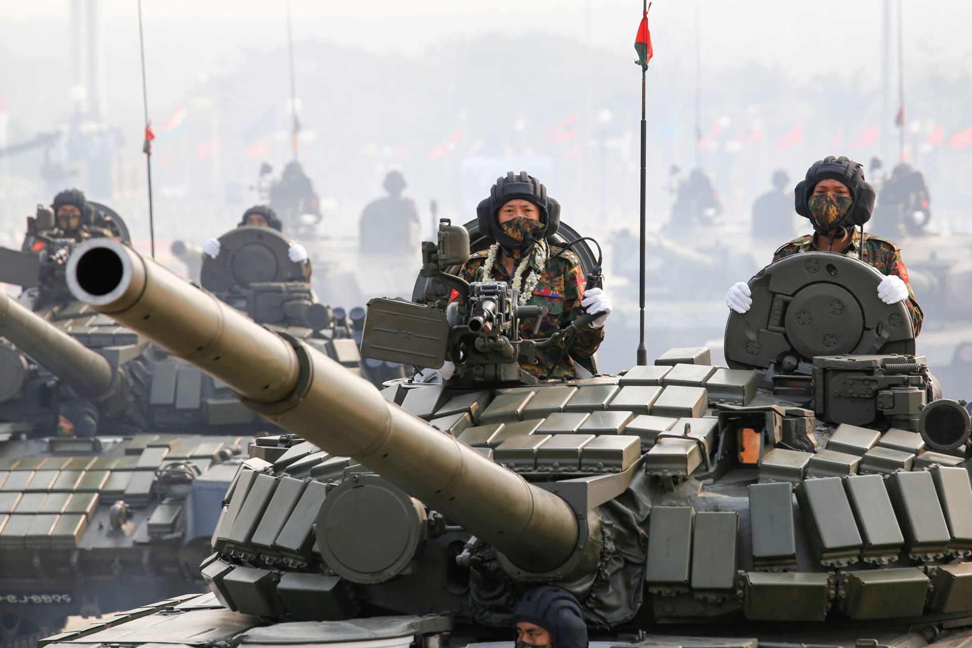 <p>Military personnel in tanks participates in a parade on Armed Forces Day in Naypyitaw, Myanmar, on March 27, 2021.</p>
