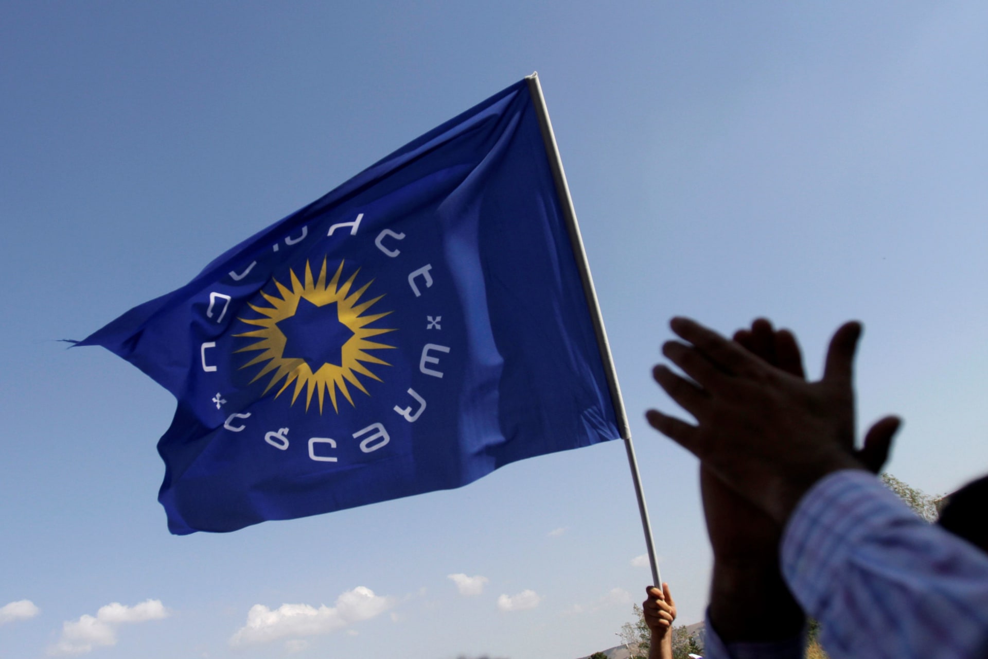 <p>Supporters of the Georgian Dream coalition gather outside the central election commission to wait for official results in Tbilisi.</p>
