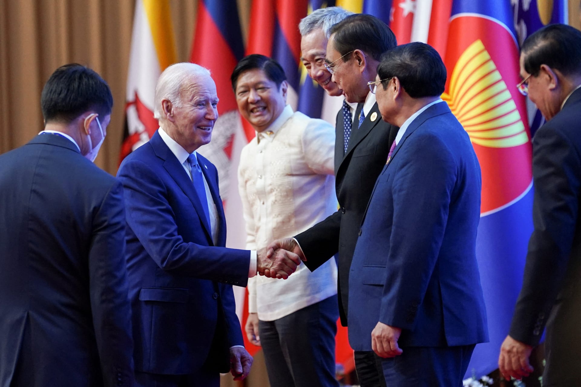 <p>U.S. President Joe Biden greets other leaders during the 2022 ASEAN summit in Phnom Penh, Cambodia, on November 12, 2022.</p>
