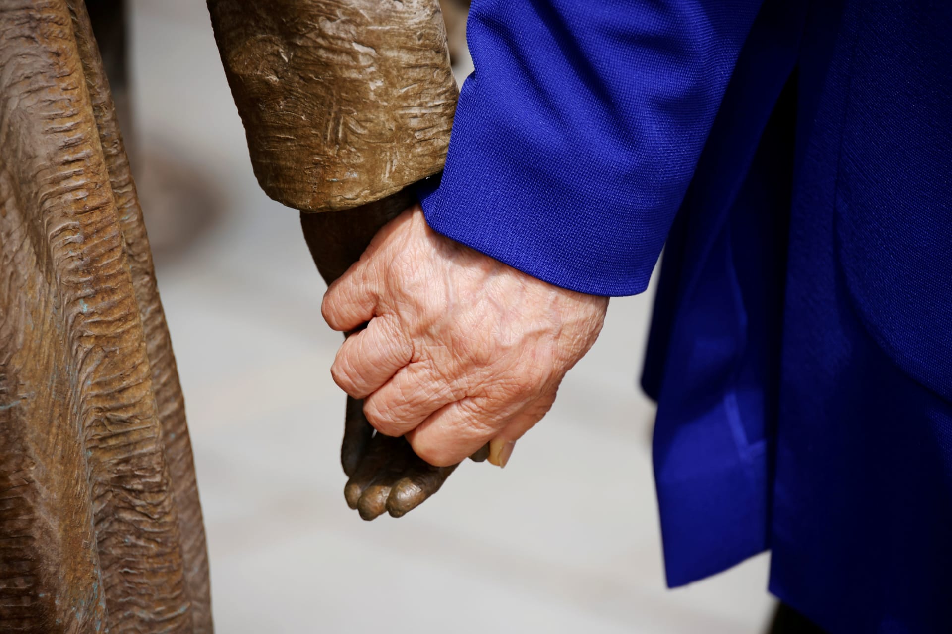 <p>Former South Korean “comfort woman” Lee Yong-soo holds the hand of a statue symbolising “comfort women” at the Seoul Comfort Women Memorial in Seoul, South Korea, June 29, 2021.</p>
