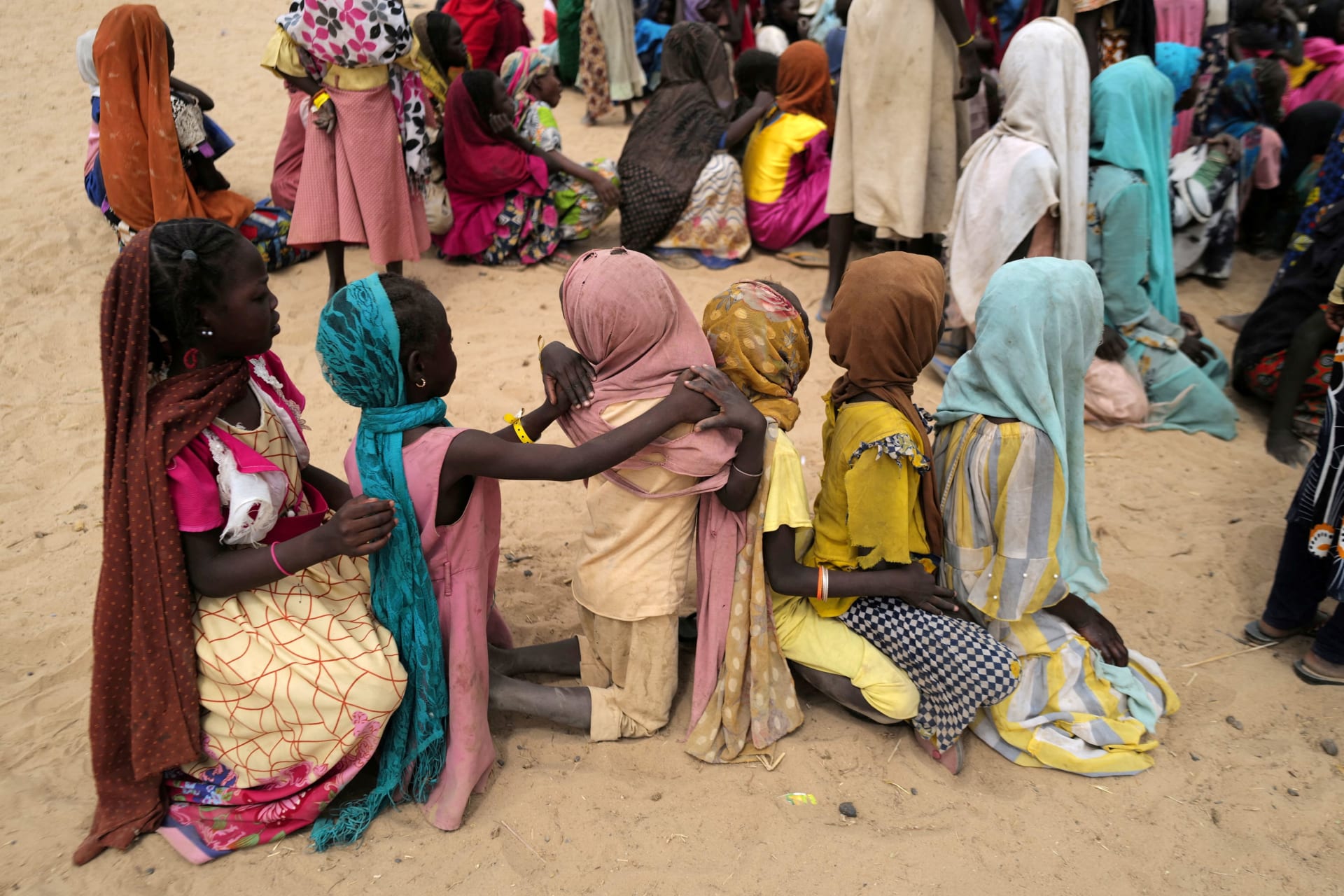 <p>Sudanese refugee girls who have fled the violence in Sudan’s Darfur region, attend their first entertainment and sport training session at makeshift shelter camps near the border between Sudan and Chad in Koufroun, Chad May 11, 2023. </p>
