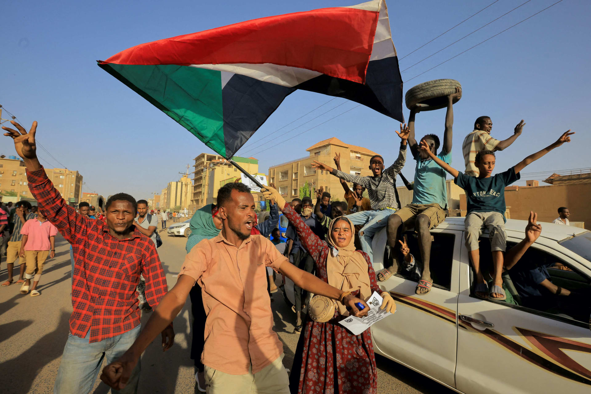 <p>Protesters march during a rally marking the anniversary of the April uprising in Khartoum, Sudan on April 6, 2023. </p>
