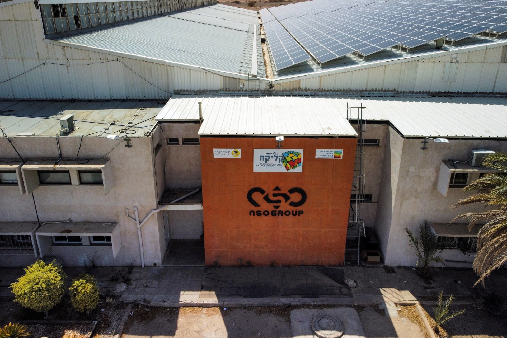 <p>An aerial view shows the logo of Israeli cyber firm NSO Group at one of its branches in the Arava Desert, southern Israel.</p>
