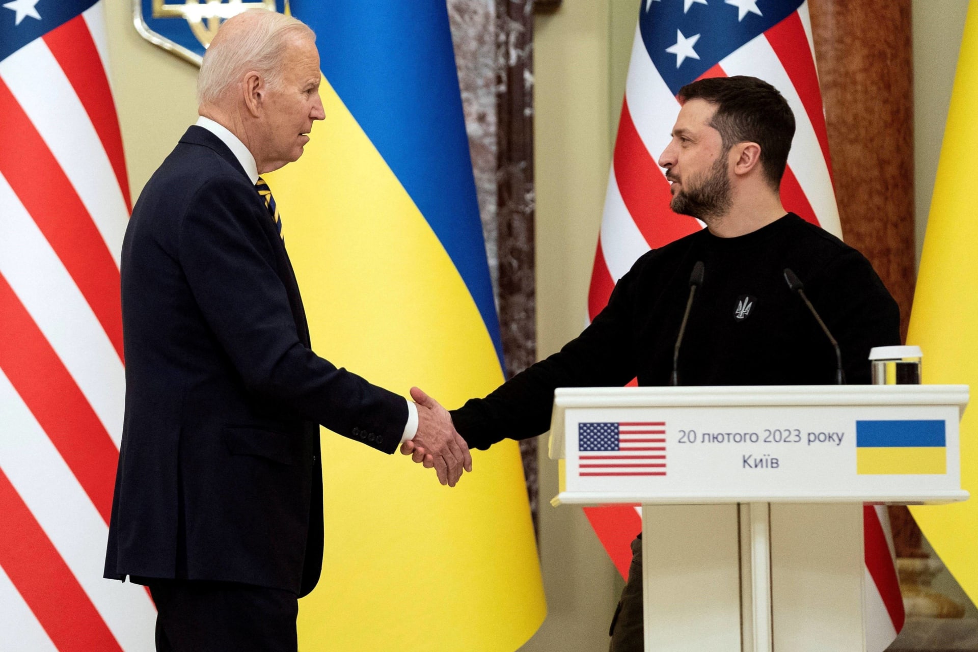 <p>U.S. President Joe Biden shakes hands with Ukrainian President Volodymyr Zelenskiy after they both delivered statements at Mariinsky Palace on an unannounced visit in Kyiv, Ukraine, Monday, Feb. 20, 2023.</p>
