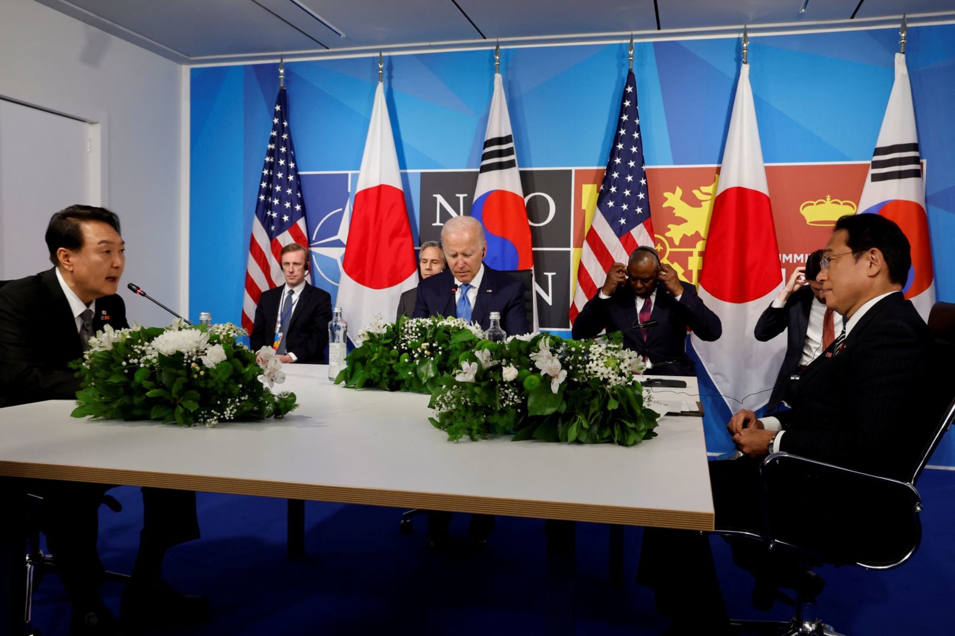 <p>South Korea’s President Yoon Suk-yeol and Japanese Prime Minister Fumio Kishida meet with U.S. President Joe Biden during a NATO summit in Madrid.</p>
