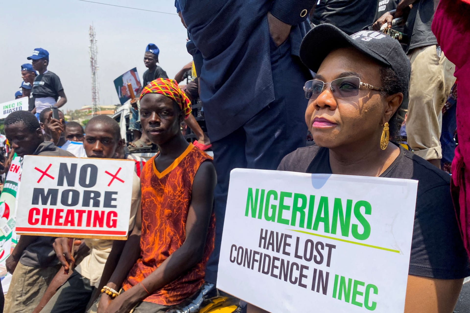 <p>Supporters of the Peoples Democratic Party (PDP) protest at the national headquarters of the Independent National Electoral Commission (INEC) to disapprove the outcome of the February 25 election result in Abuja, Nigeria on March 6, 2023.</p>
