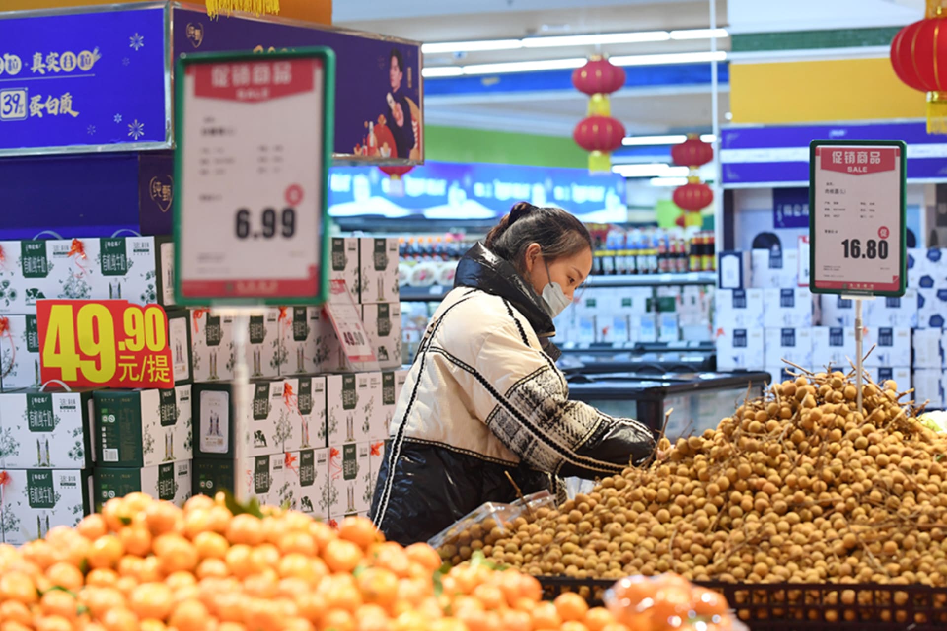 <p>People shop at a supermarket in China’s Guizhou Province.</p>
