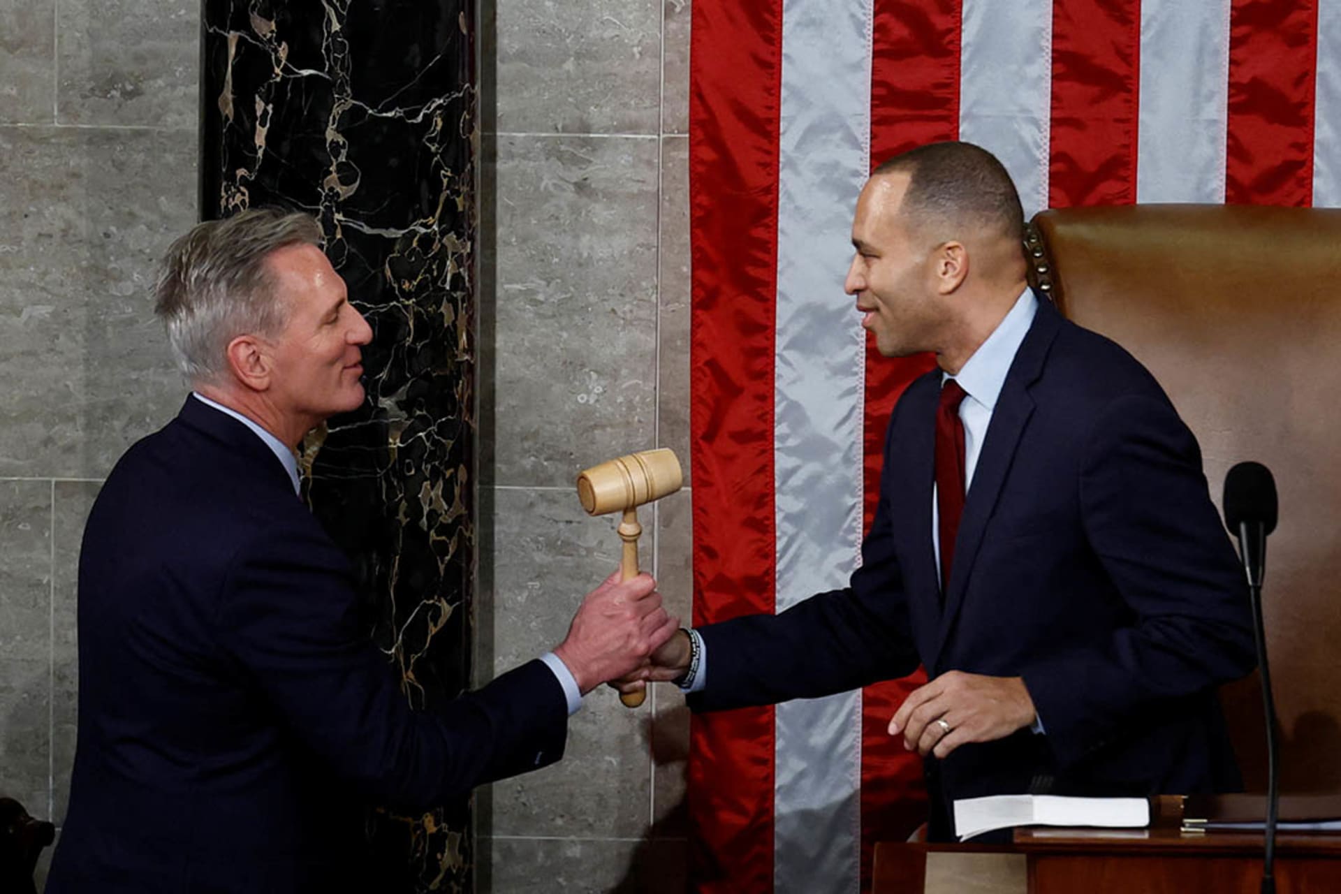 <p>Minority Leader Hakeem Jeffries passes the gavel to Kevin McCarthy after McCarthy was elected Speaker of the House on January 7, 2023. </p>

