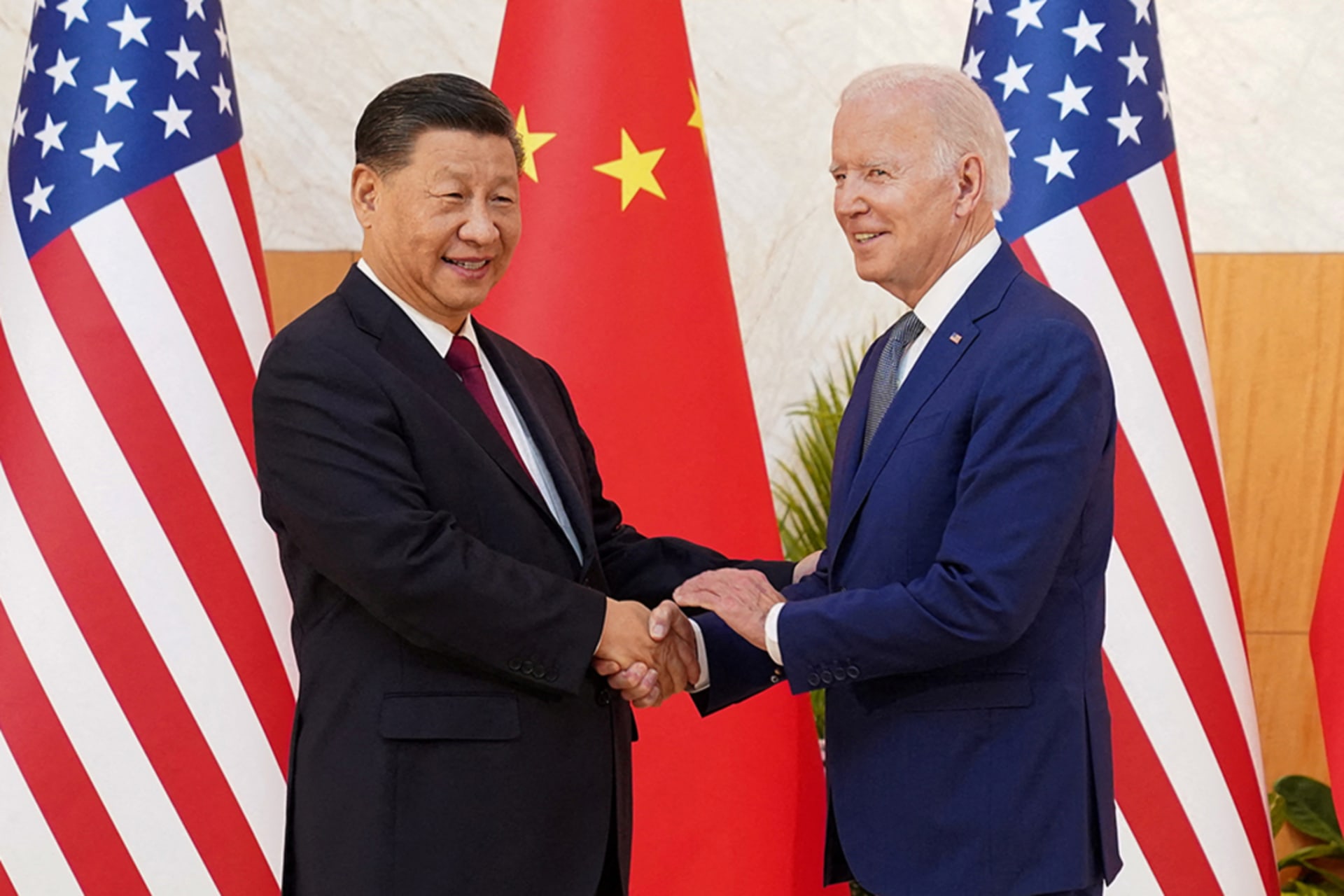 <p>U.S. President Joe Biden shakes hands with Chinese President Xi Jinping as they meet on the sidelines of the G20 leaders’ summit in Bali, Indonesia, November 14, 2022.</p>
