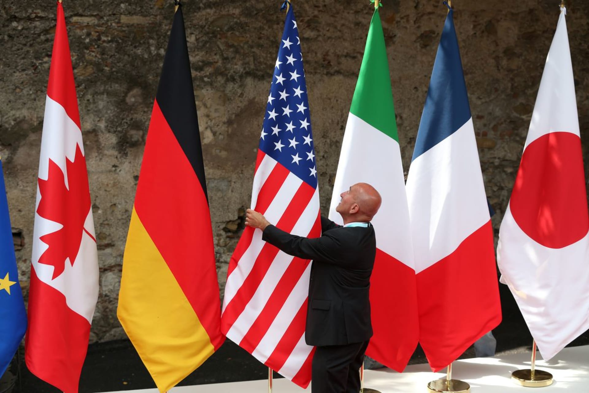 <p>Flags are placed at a G7 summit in Italy in May 2017.</p>
