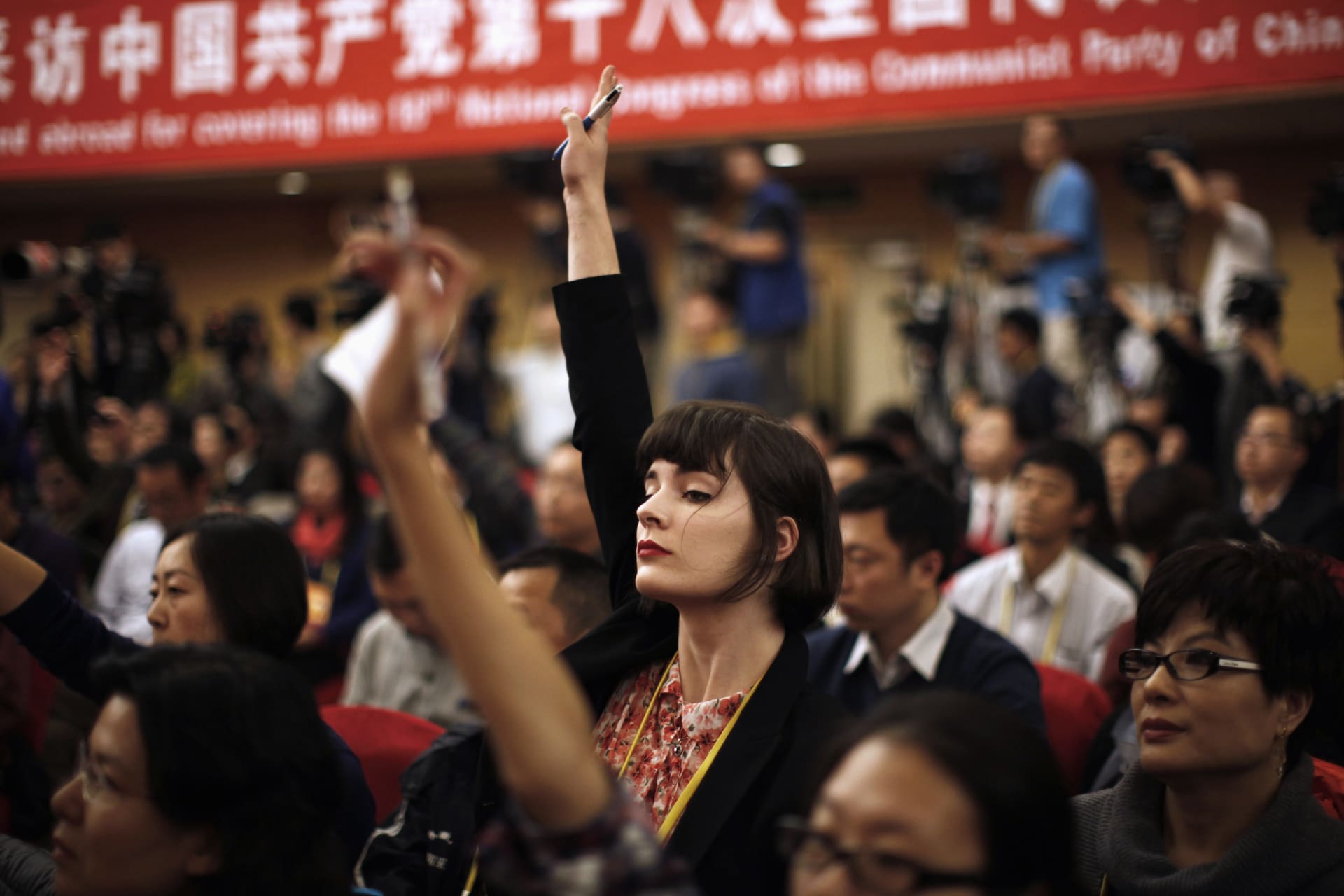 <p>A journalist from Global CAMG Media Group asks a question during a news conference in Beijing on November 12, 2012. Melbourne-based Global CAMG Media Group is majority owned by China Radio International, the country’s state run radio network.</p>
