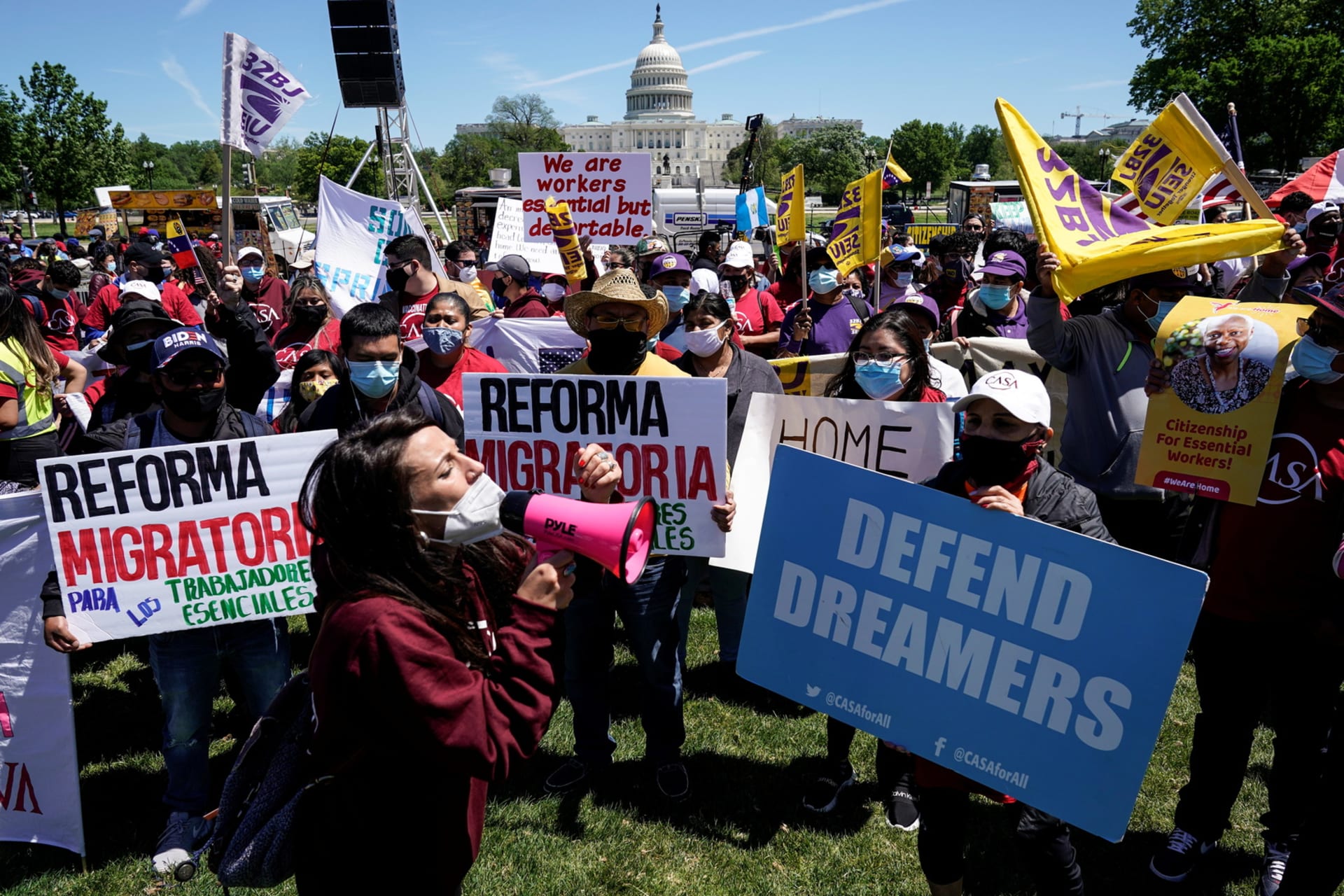 <p>Pro-immigration activists call for immigration reform near the Capitol in Washington on May 1, 2021</p>