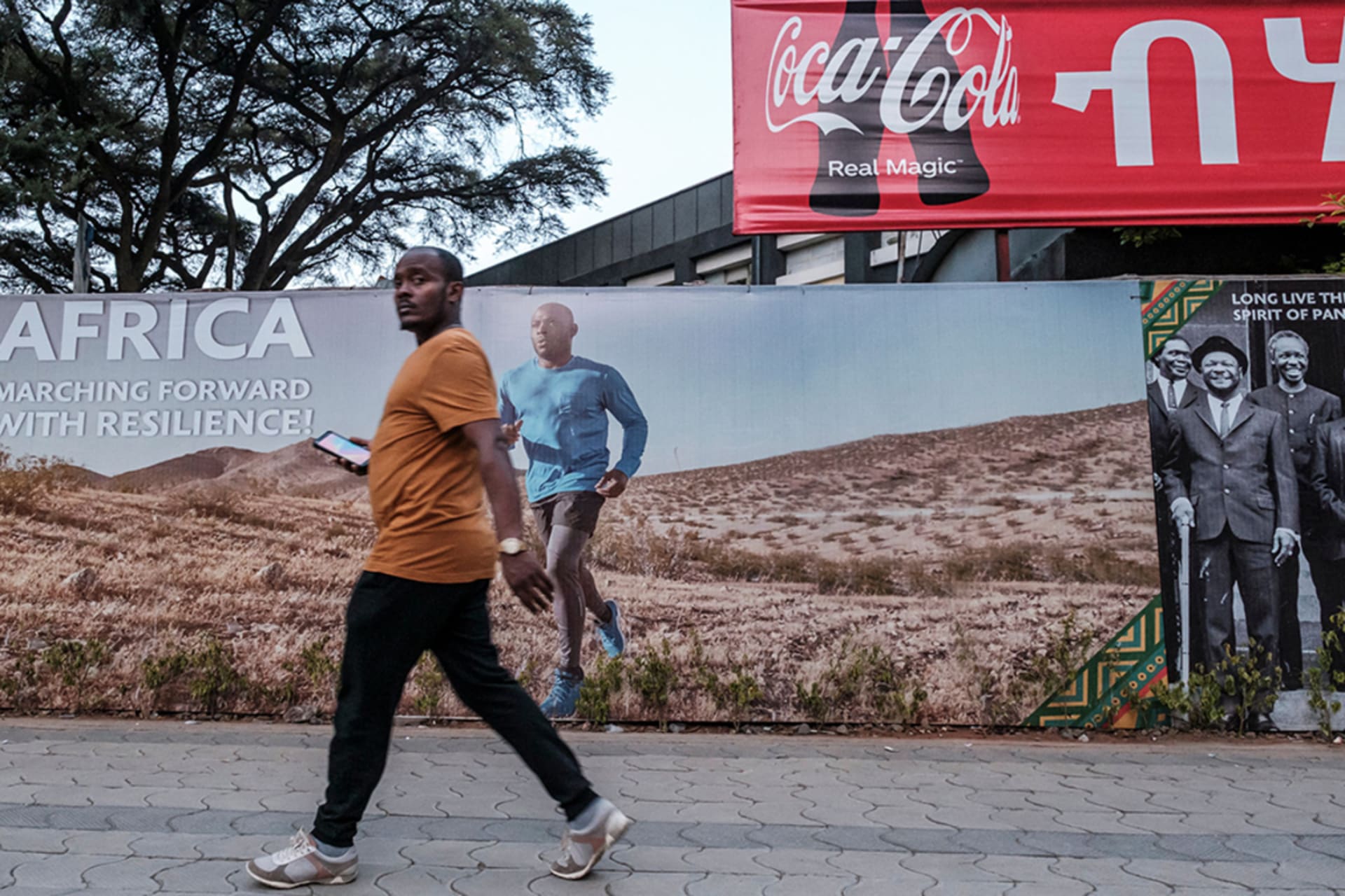 <p>A man walks in Addis Ababa, Ethiopia, on May 24, 2022.</p>
