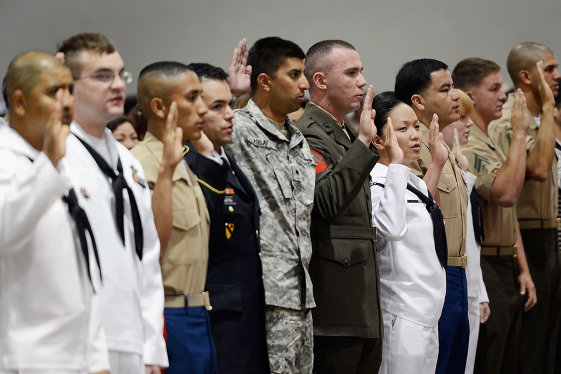 <p>Several members of U.S. armed forces take the oath of citizenship at a naturalization ceremony at the Los Angeles Convention Center on June 27, 2012 in Los Angeles, California.</p>
