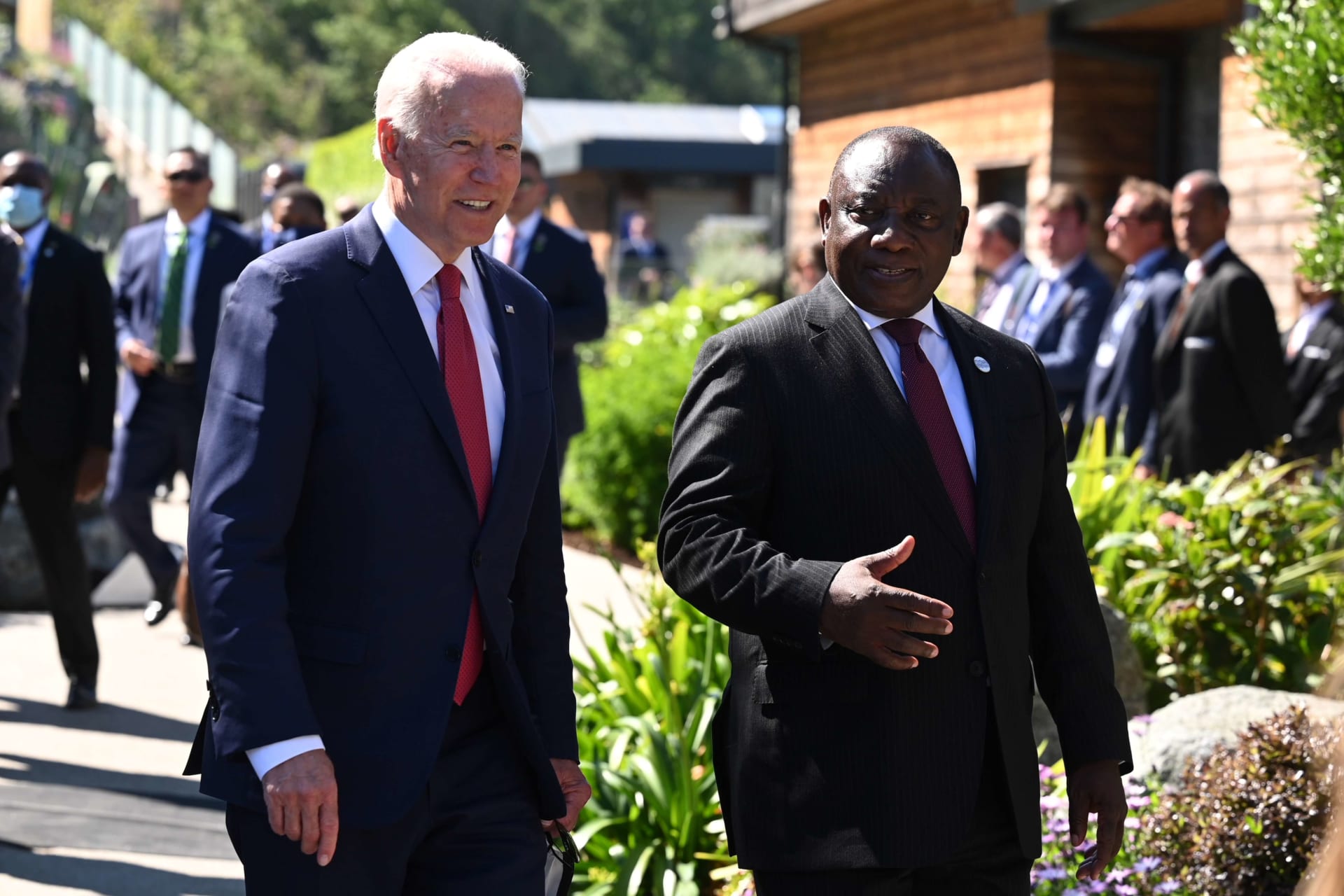 <p>President Joe Biden talks with South Africa’s President Cyril Ramaphosa as they arrive for a working session during the G7 summit in Carbis Bay, Cornwall, Britain, on June 12, 2021.</p>
