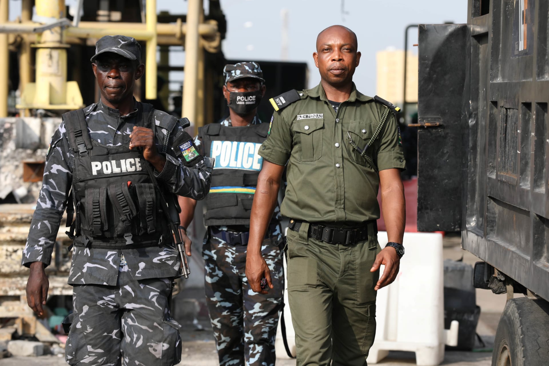 <p>Police officers are seen during a protest against the reopening of the Lekki Toll Gate in Lagos on February 13, 2021.</p>
