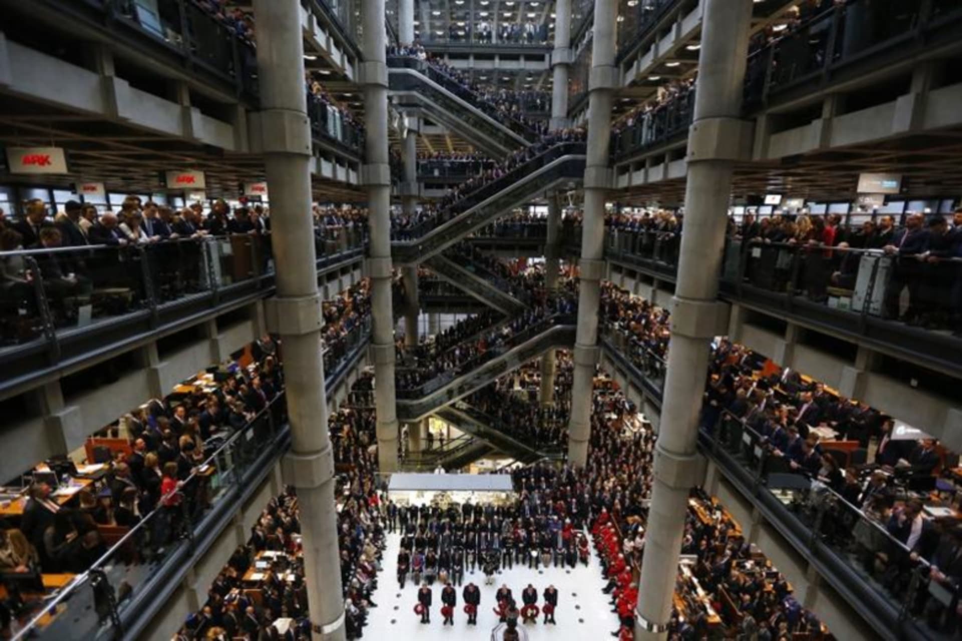 <p>Lloyd’s of London staff during their annual Armistice Day service in 2016.</p>

