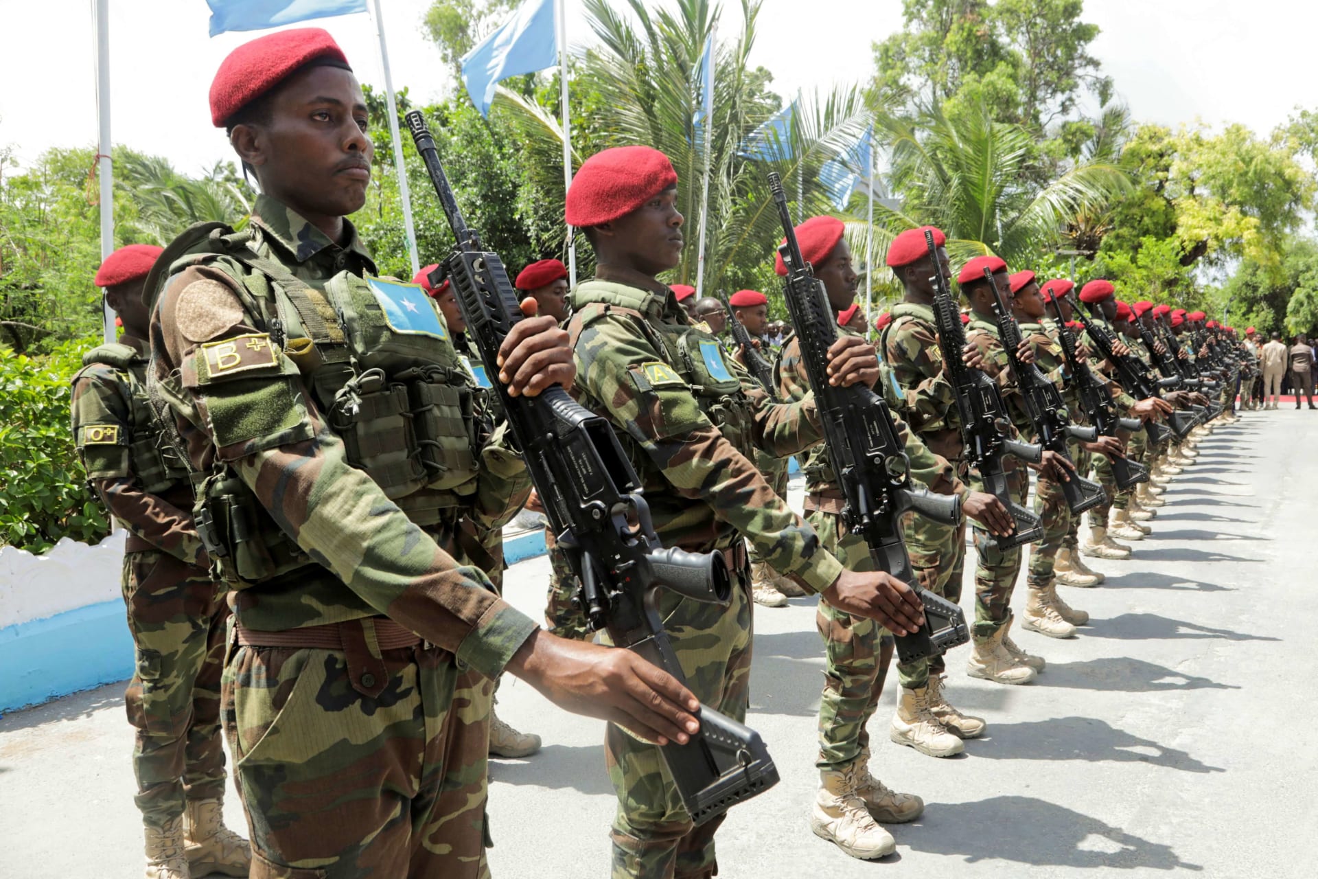 <p>Members of Somalia’s military officers parade during the handover ceremony of newly elected President Hassan Sheikh Mohamud in Mogadishu, Somalia, May 23, 2022</p>
