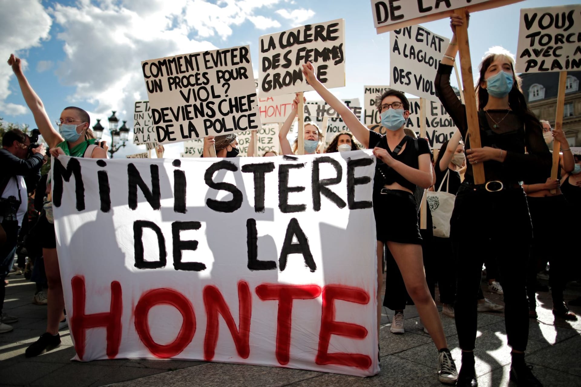 <p>Feminist activists hold a banner reading “ministry of shame” during a protest against the appointments of French Interior Minister Gerald Darmanin in the new French government, in front of the city hall in Paris, France on July 10, 2020.</p>
