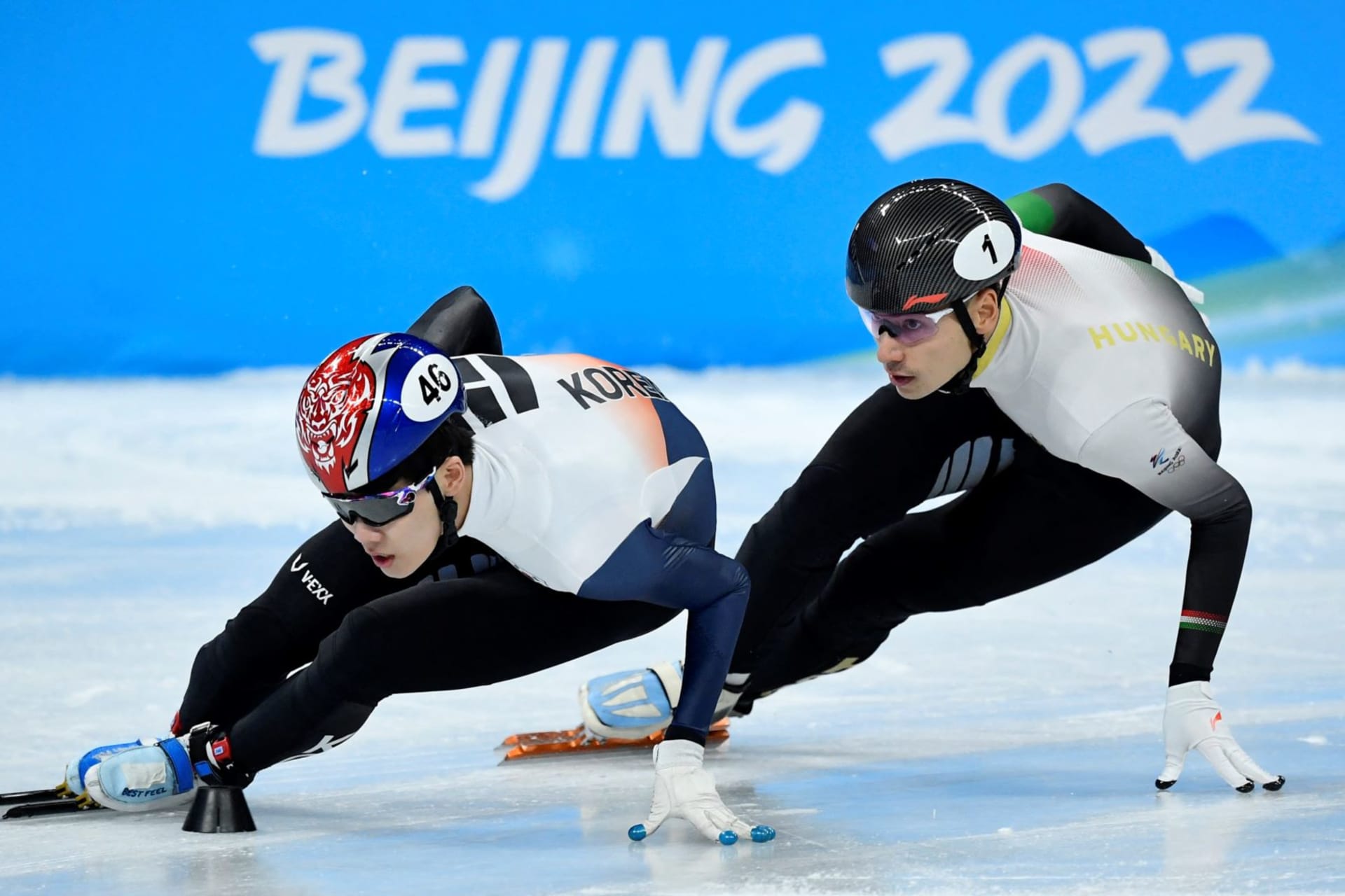 <p>Lee June-seo of South Korea and Shaoang Liu of Hungary during the Short Track Speed Skating Men’s 1000m Quarterfinals for the 2022 Beijing Olympics on February 7, 2022.</p>
