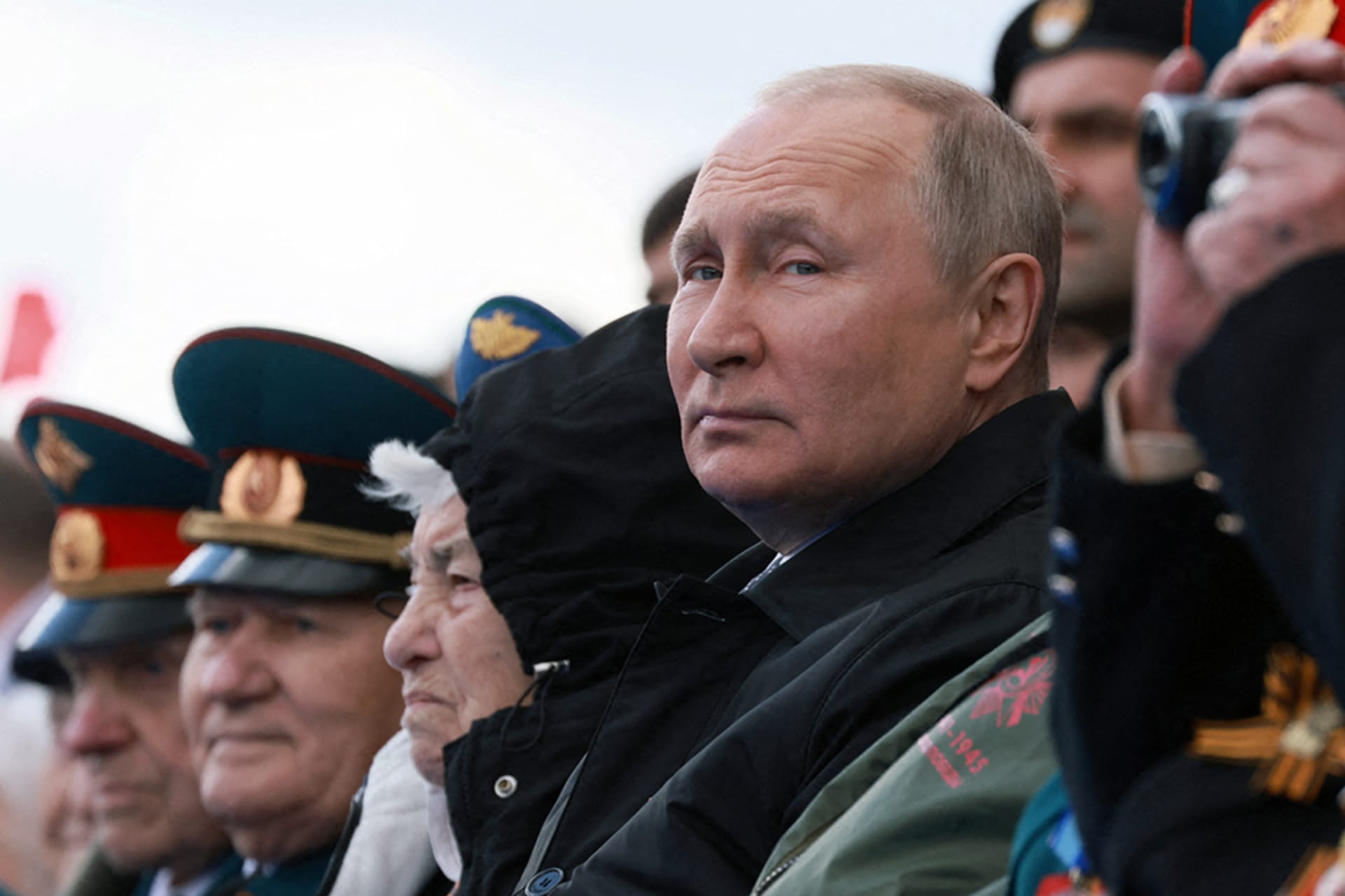<p>Russian President Vladimir Putin watches a military parade on Victory Day in central Moscow, Russia May 9, 2022.</p>
