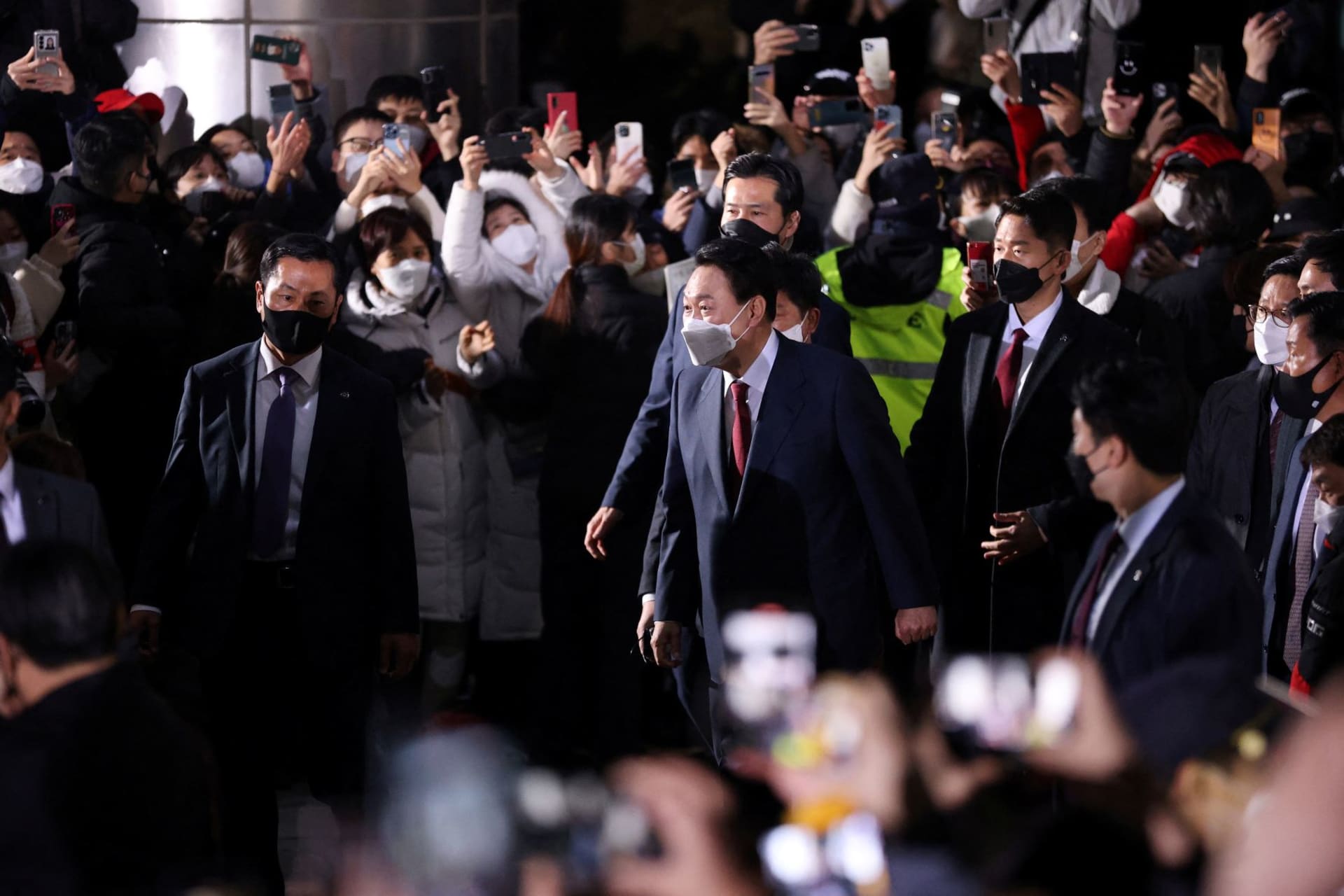 <p>President-Elect Yoon Suk-yeol leaves his house to meet supporters in Seoul, South Korea on March 10, 2022. </p>