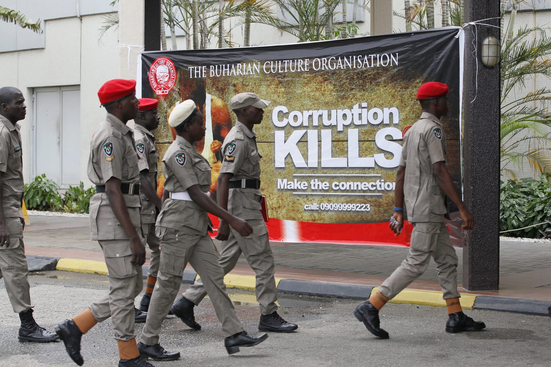 <p>Security personnel arrive at the first annual summit of the anticorruption group “Buharian Culture Organization” in Abuja, Nigeria in 2015.</p>
