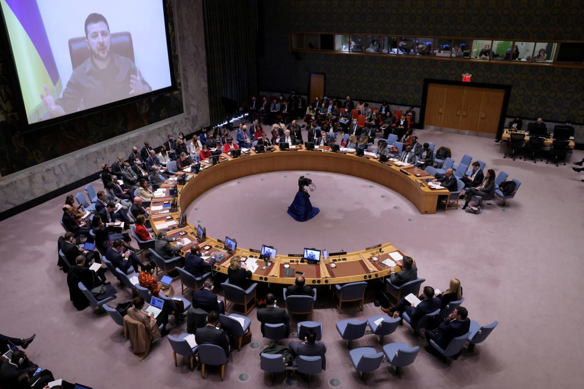 <p>Ukrainian President Volodymyr Zelenskyy appears on a screen as he addresses the United Nations Security Council via video link during a meeting amid Russia’s invasion of Ukraine, at the United Nations Headquarters in New York City on April 5, 2022. </p>
