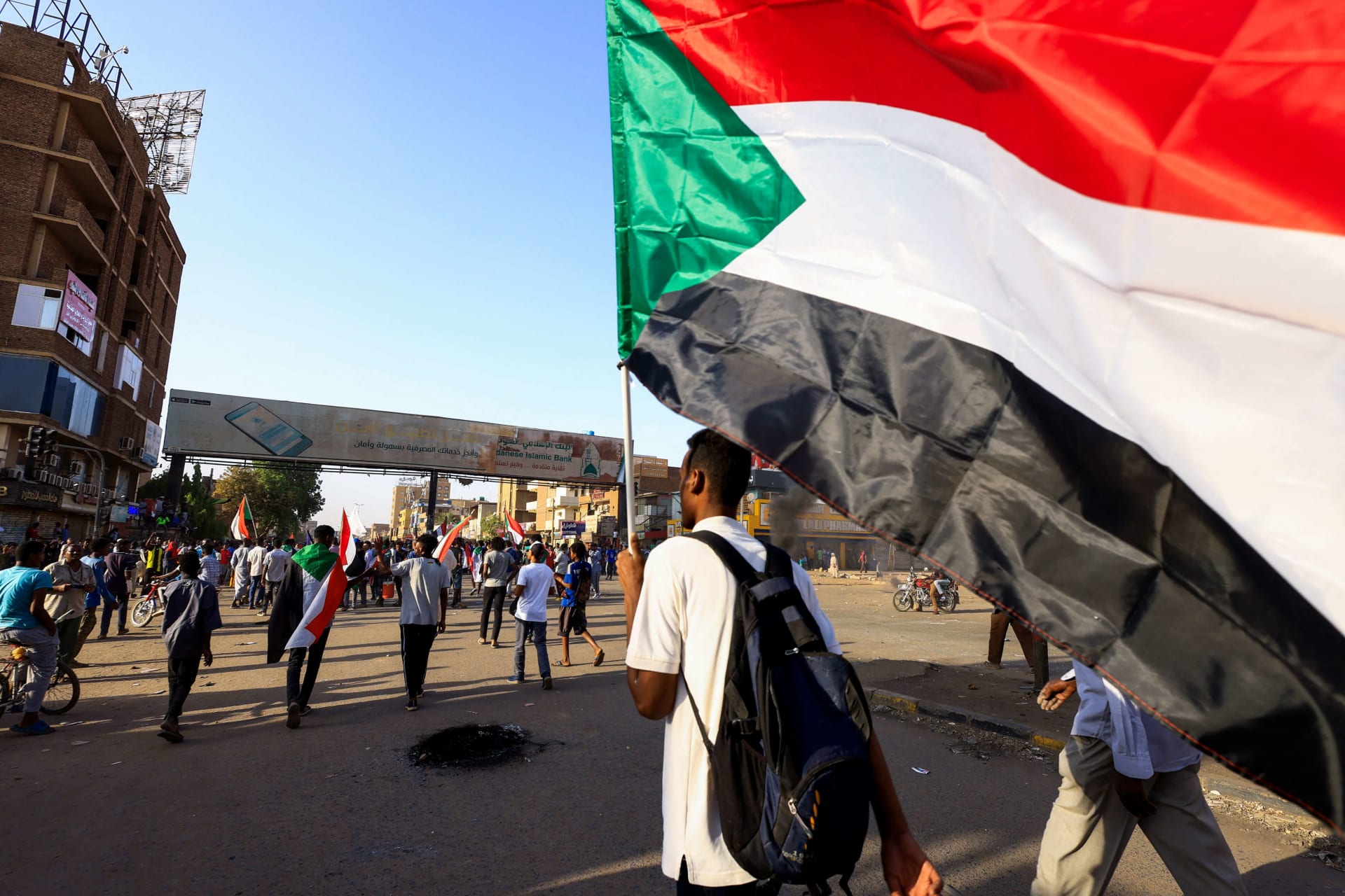 <p>Protesters take part in a rally against military rule following a coup to commiserate the anniversary of a sit-in that culminated with Bashir’s overthrow in Khartoum North, Sudan on April 6, 2022.</p>
