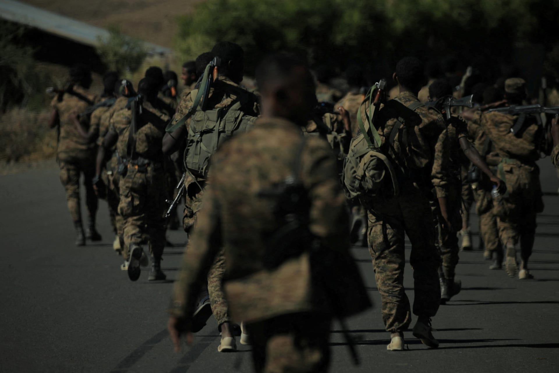 <p>Members of the Ethiopian National Defence Force march in the Shumsheha village near Lalibela town, Ethiopia on January 26, 2022.</p>
