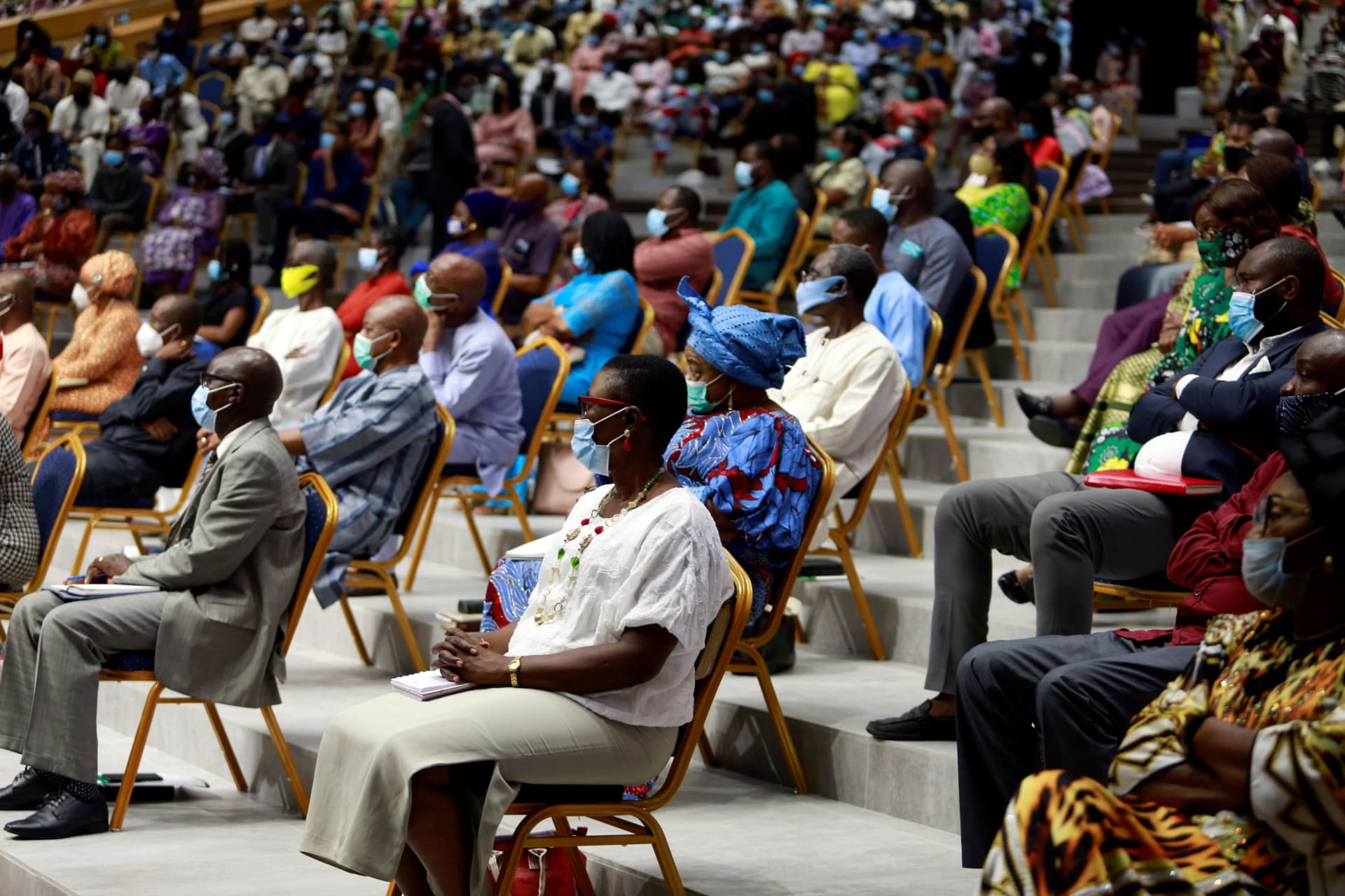 <p>Worshippers wearing face masks attend a Sunday service at a church in Lagos, Nigeria on October 25, 2020.</p>
