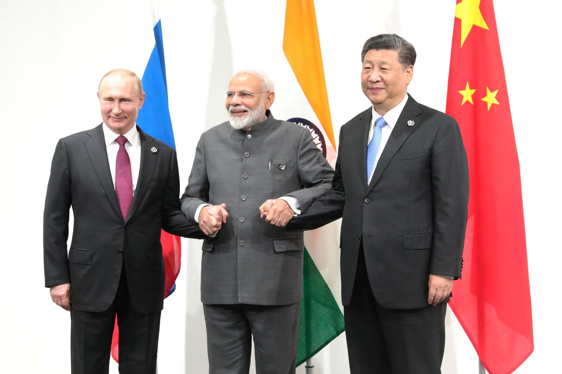 <p>Russia’s President Vladimir Putin, India’s Prime Minister Narendra Modi and China’s President Xi Jinping pose for a picture during a meeting at the G20 summit in Osaka, Japan on June 28, 2019.</p>
