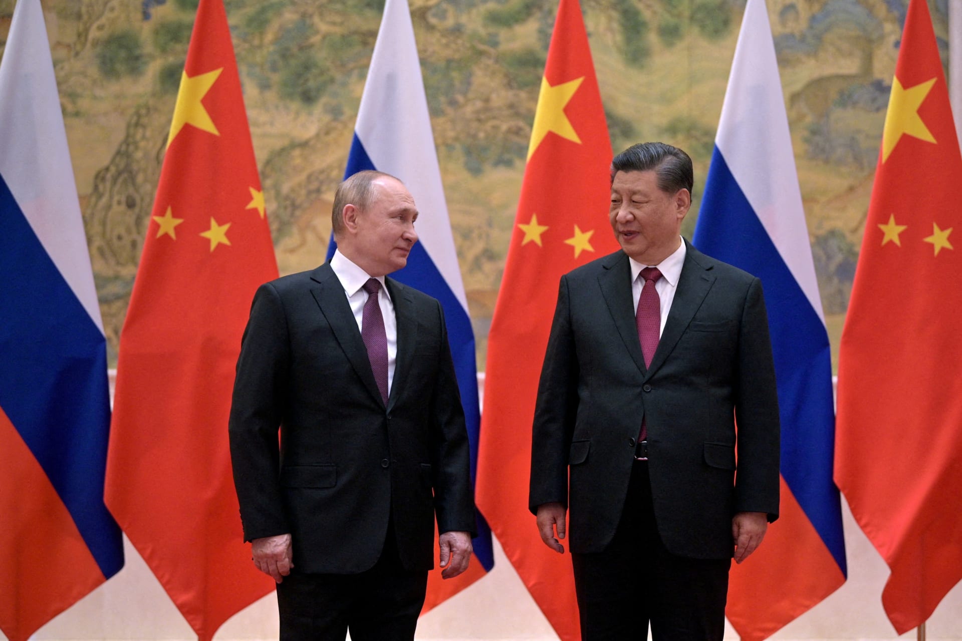 <p>Russian President Vladimir Putin attends a meeting with Chinese President Xi Jinping in Beijing, China, on February 4, 2022.</p>
