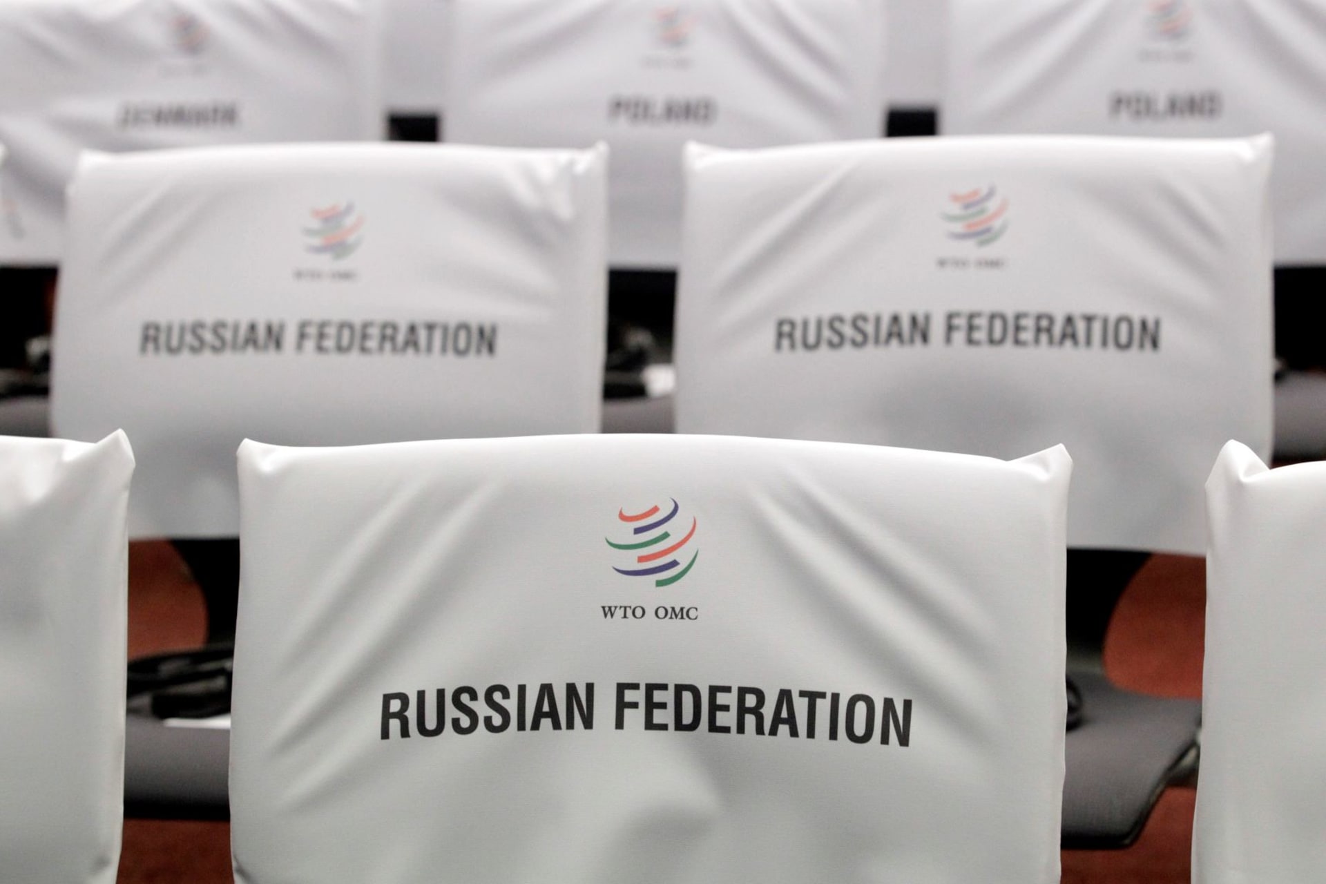 <p>Seats for delegates are pictured before the ceremony marking the accession of Russia to the WTO during the 8th WTO Ministerial Conference in Geneva in December 2011.</p>
