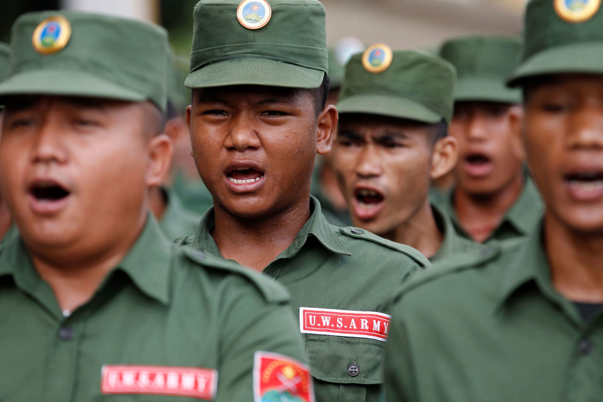 <p>United Wa State Army (UWSA) soldiers march during a display for the media in Pansang, Wa territory in north east Myanmar on October 4, 2016.</p>
