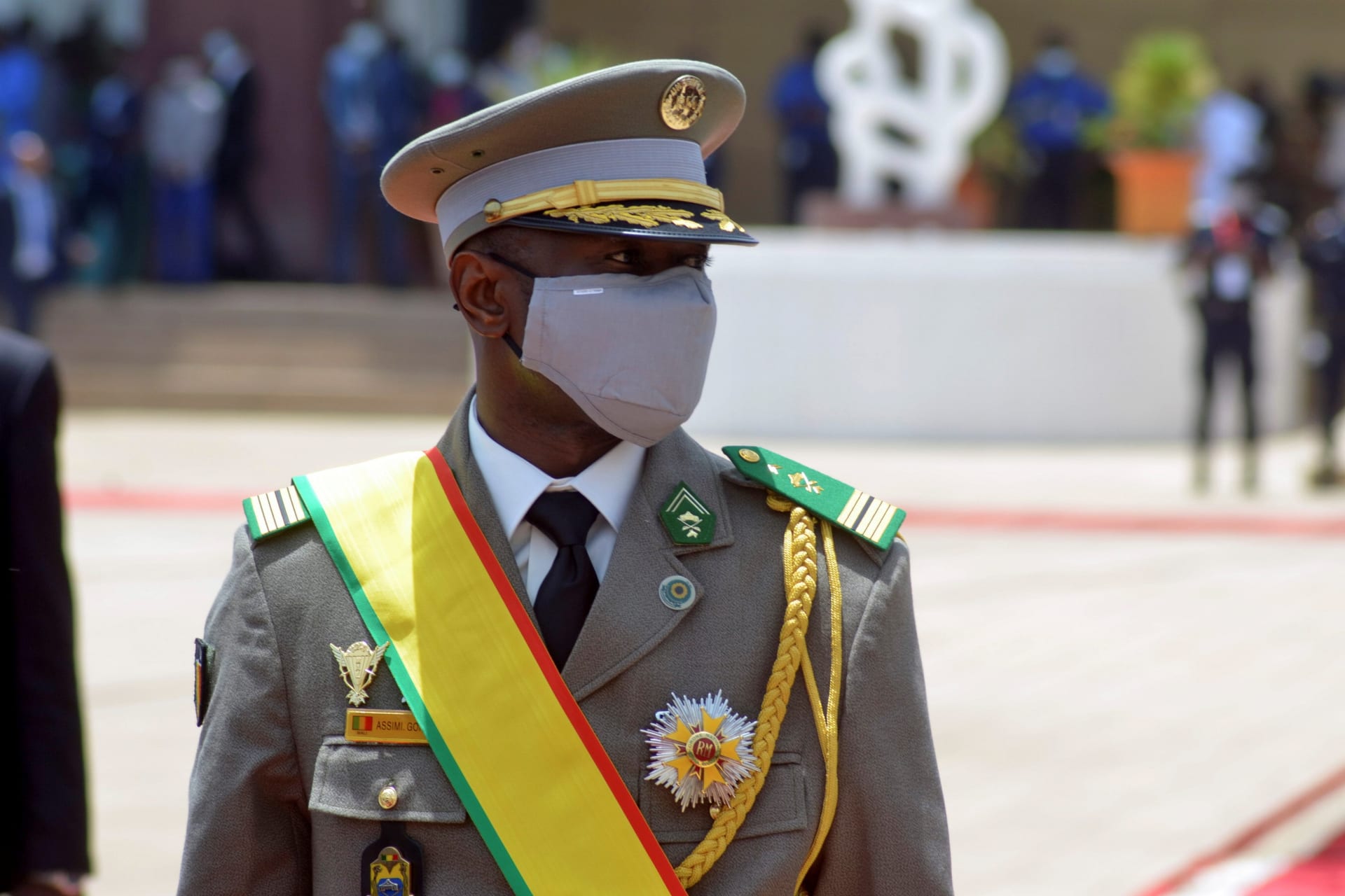 <p>Colonel Assimi Goita, leader of two military coups and new Malian interim president, walks during his inauguration ceremony in Bamako, Mali on June 7, 2021.</p>
