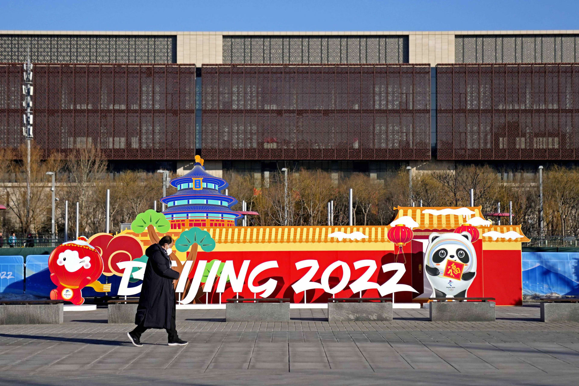 <p> A person walks in the Olympic Park inside the closed loop before the Beijing 2022 Winter Olympic Games. </p>

