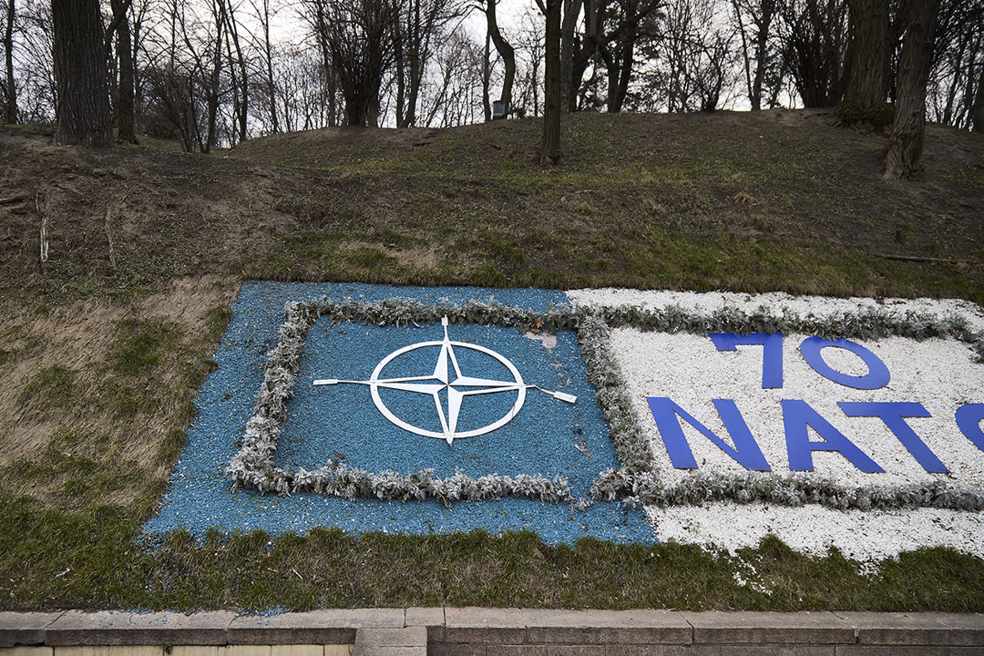 <p>A NATO sign marks the seventieth anniversary of the Atlantic alliance in Kyiv, Ukraine. </p>
