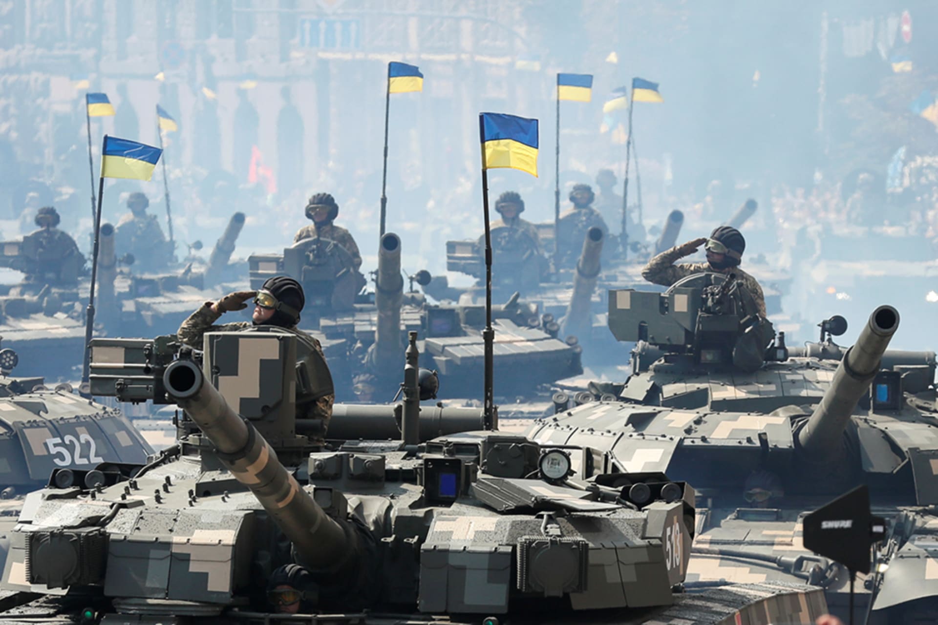 <p>Ukrainian service members drive tanks during the Independence Day military parade in Kyiv, Ukraine, in August 2021.</p>
