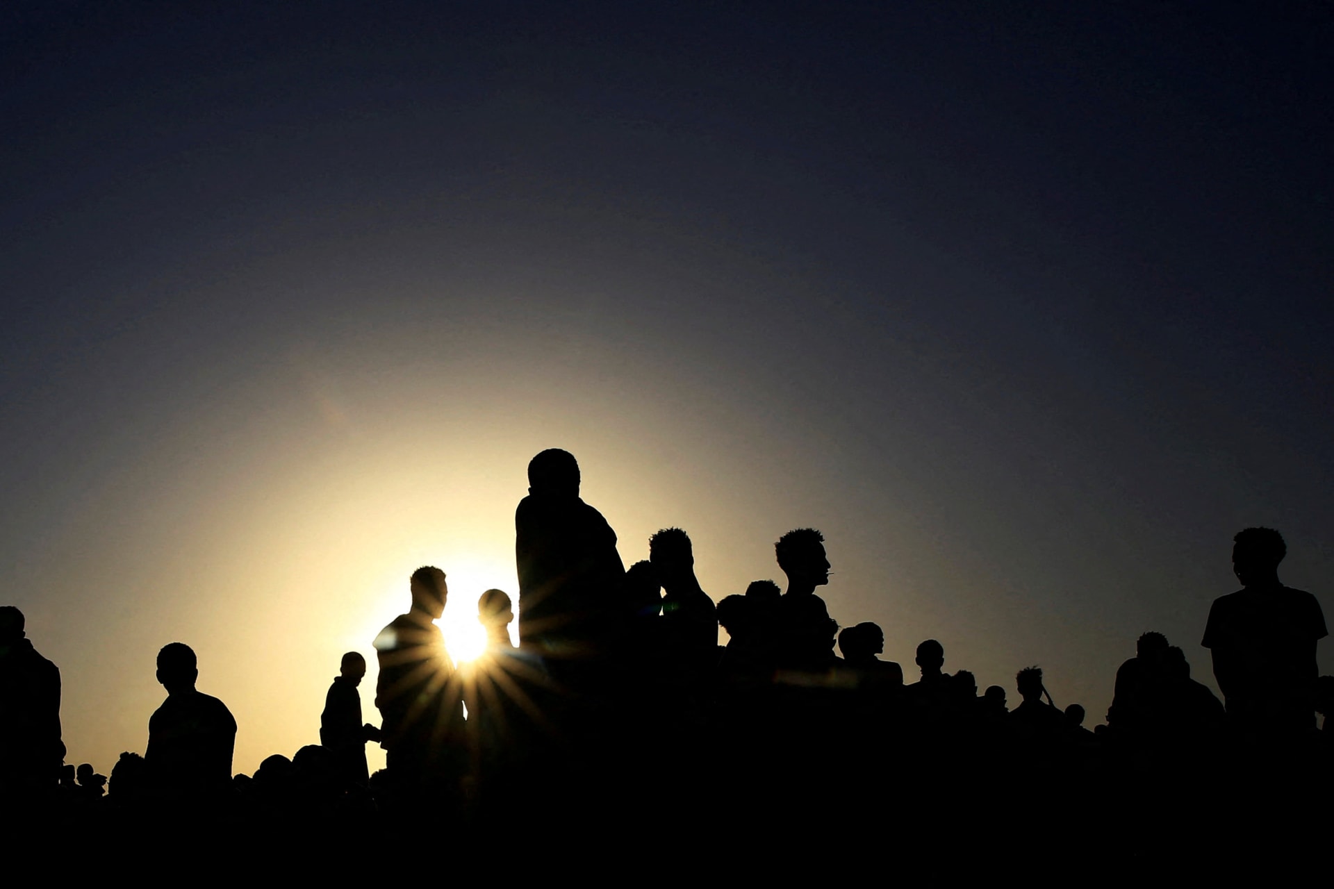<p>Ethiopians who fled fighting in Tigray region gather in Hamdayet village, near the Sudan-Ethiopia border, eastern Kassala State, Sudan on November 22, 2020.</p>
