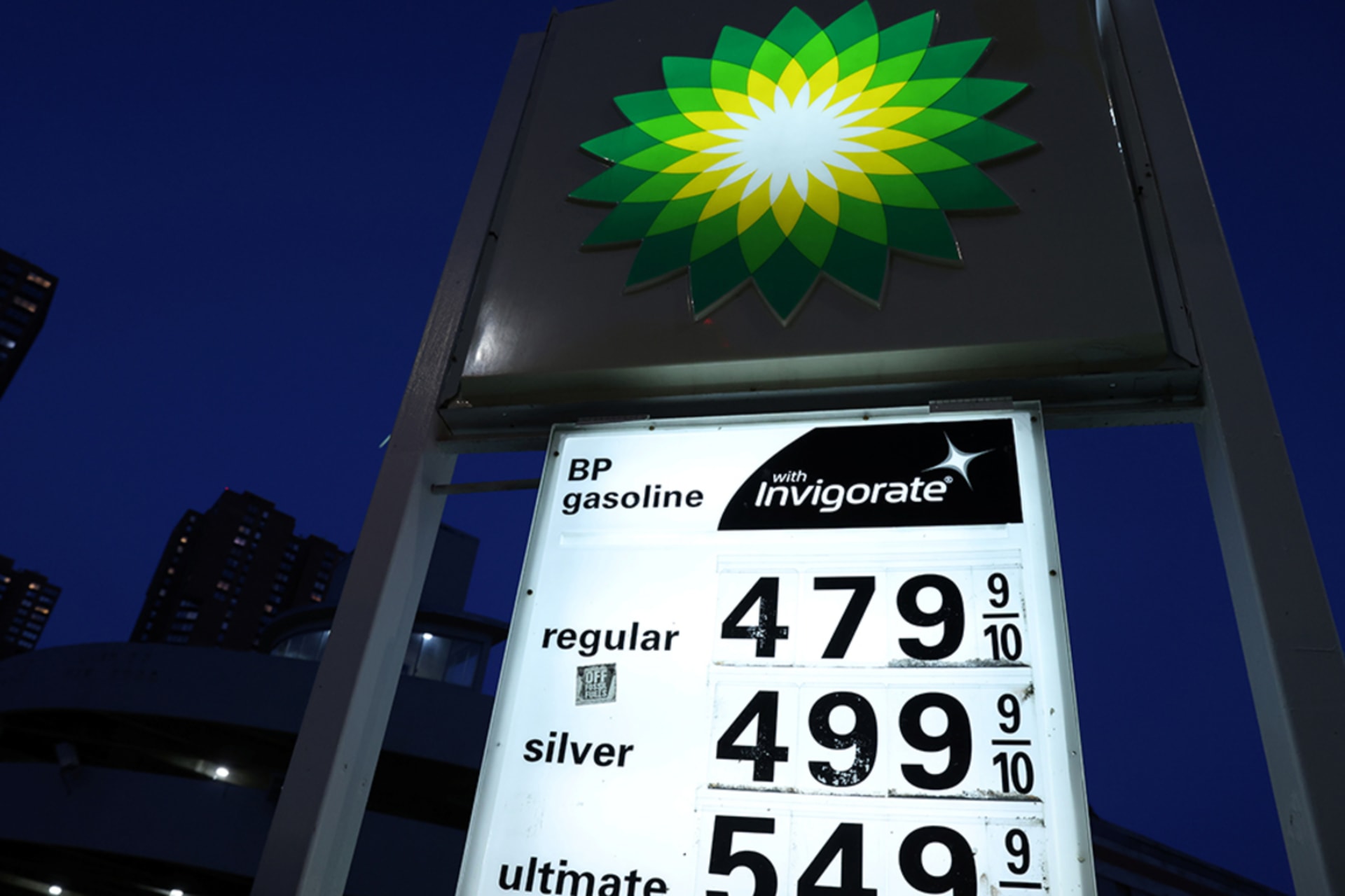 <p>Prices are seen displayed at a BP gas station in New York City in November 2021.</p>

