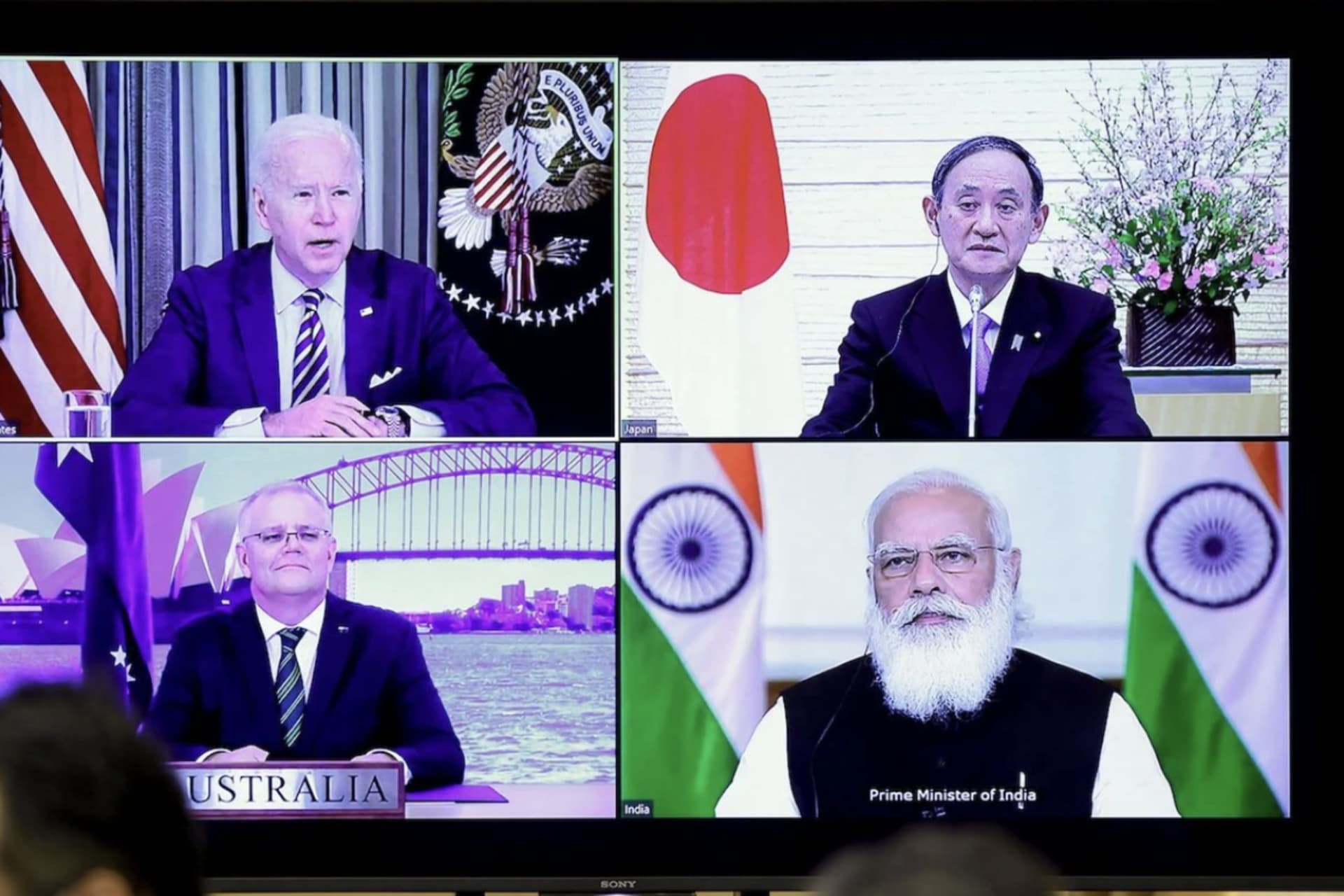 American, Japanese, Australian, and Indian leaders hold a virtual meeting of the Quadrilateral Security Dialogue in Tokyo on March 12