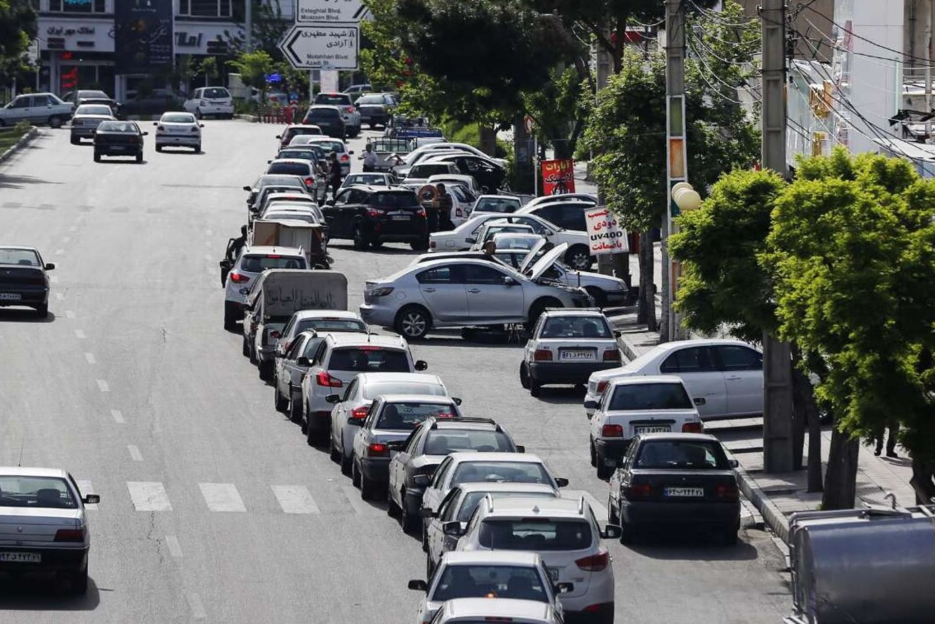 <p>Cars queueing in front of a gas station during an Israeli cyberattack on Iran’s country’s fuel subsidy network.</p>
