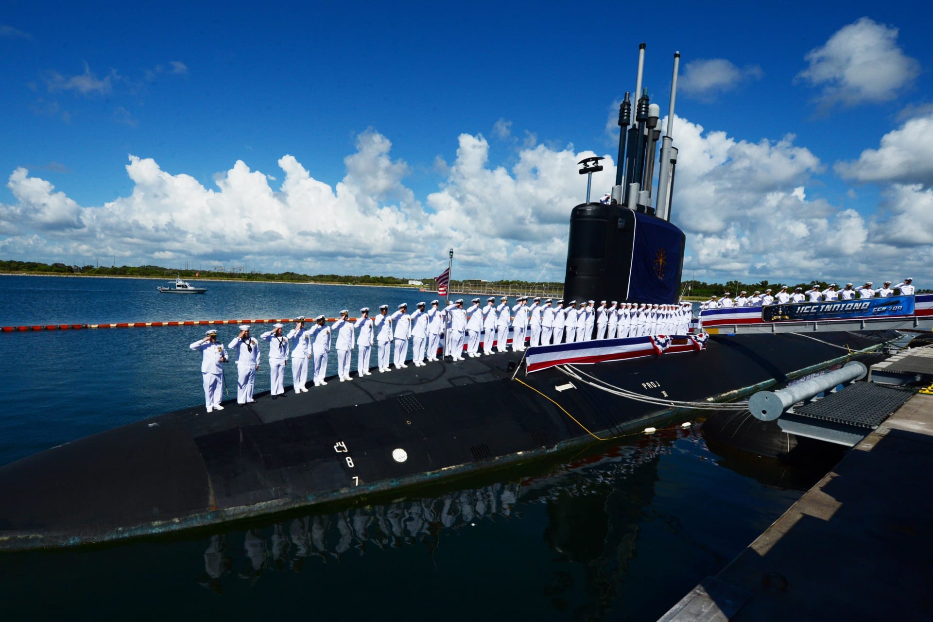 <p>The crew of the Virginia-class attack submarine USS Indiana (SSN 789) salute during the boat’s commissioning ceremony.</p>
