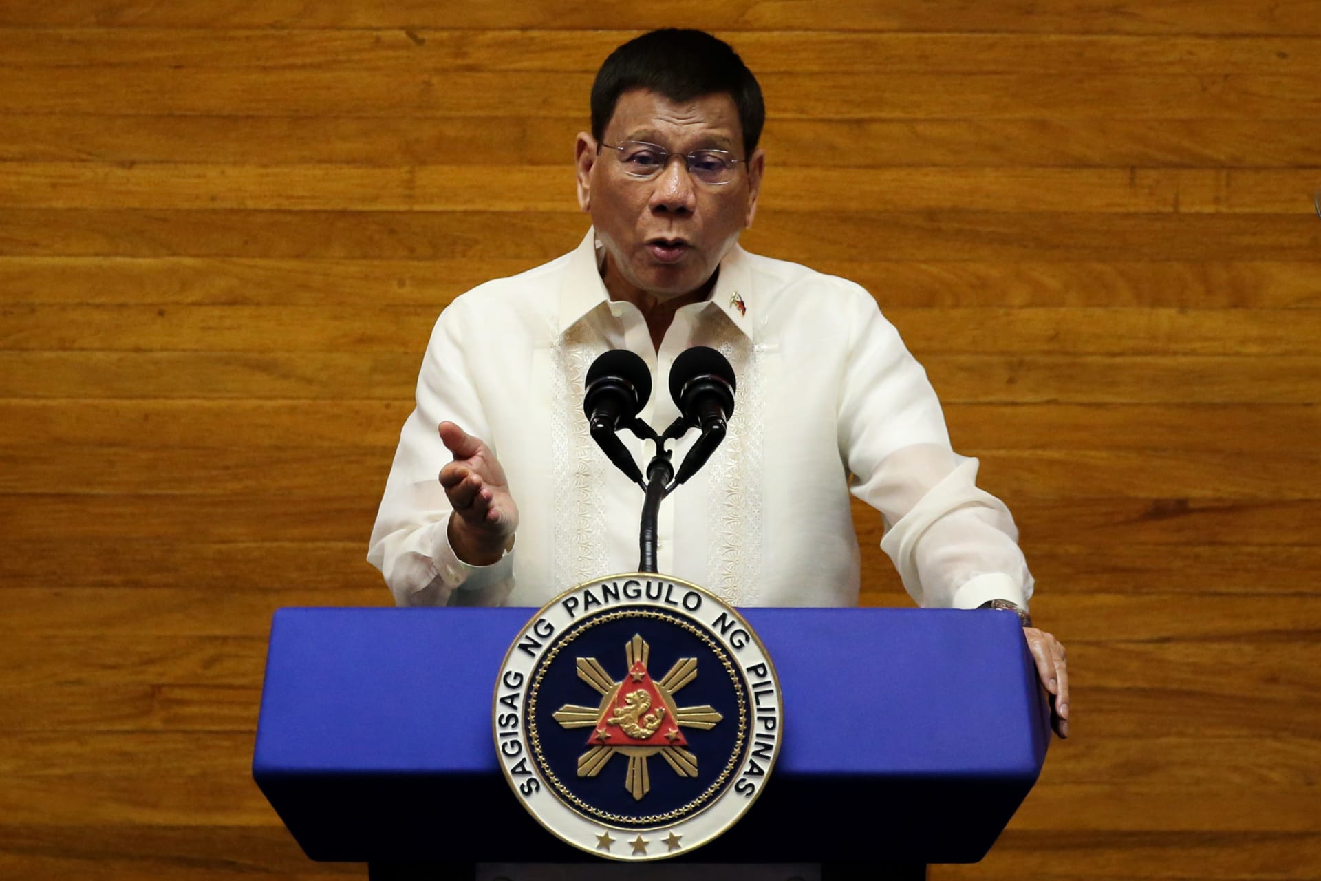 <p>Philippine President Rodrigo Duterte gestures as he delivers his 6th State of the Nation Address (SONA), at the House of Representatives in Quezon City, Metro Manila, Philippines, on July 26, 2021.</p>
