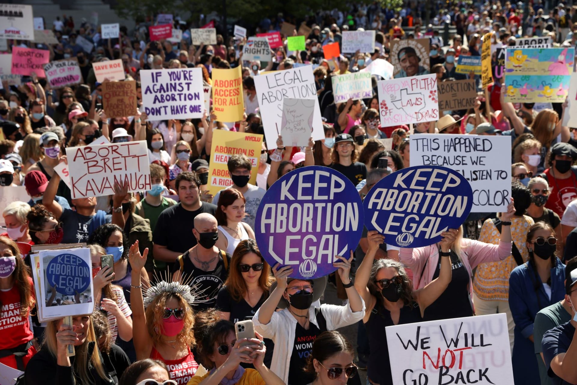 <p>People protest the restrictive Texas abortion law in New York City during the 2021 Women’s March.</p>
