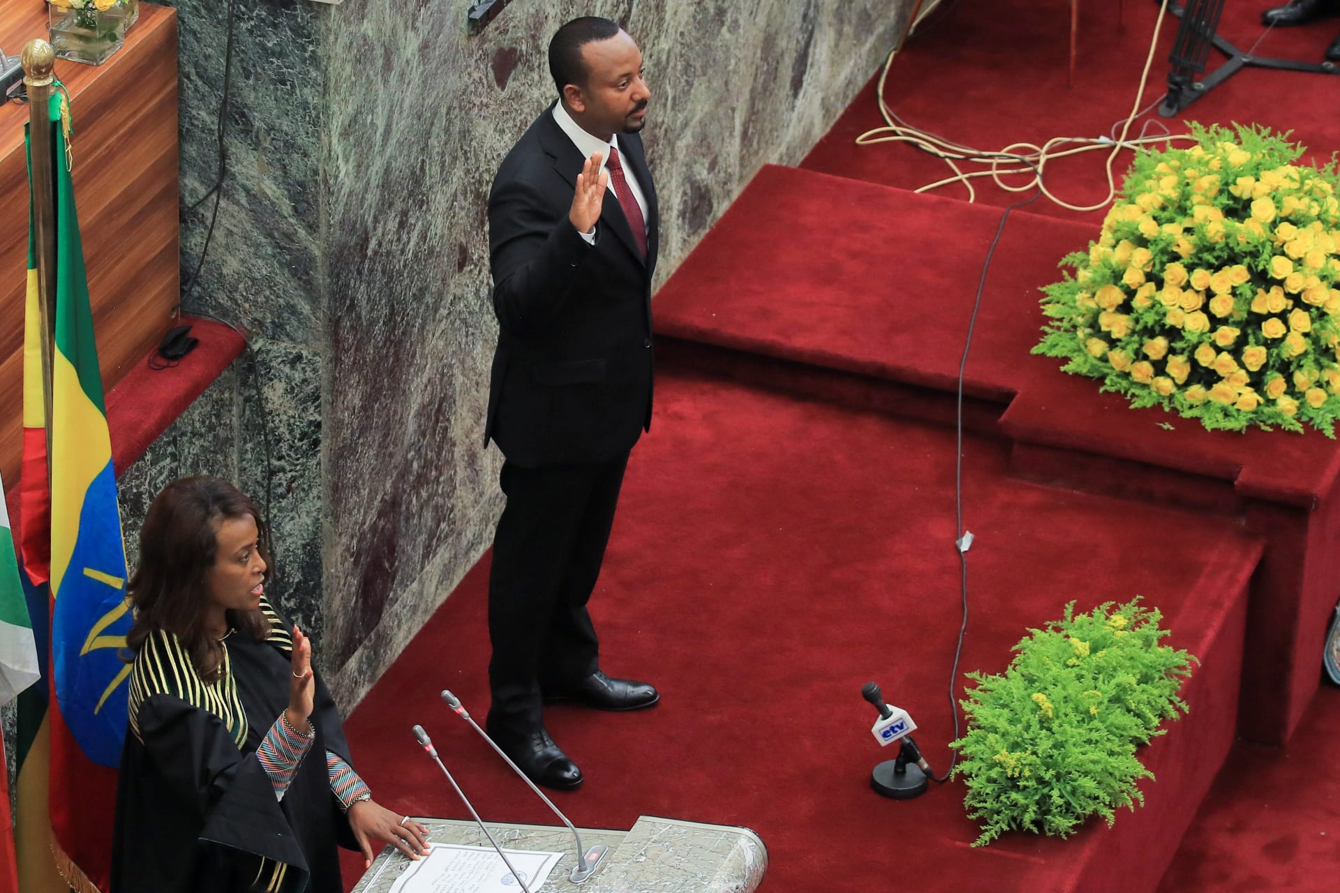<p>Ethiopia’s Prime Minister Abiy Ahmed takes oath during his incumbent ceremony at the Parliament building in Addis Ababa, Ethiopia on October 4, 2021.</p>
